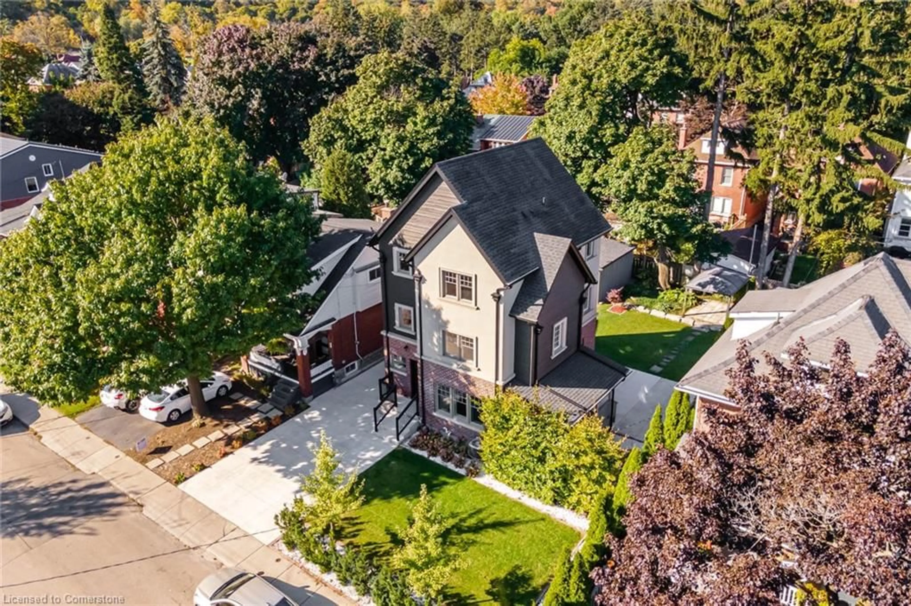 Frontside or backside of a home, the street view for 100 Kensington Ave, Hamilton Ontario L8M 3H3