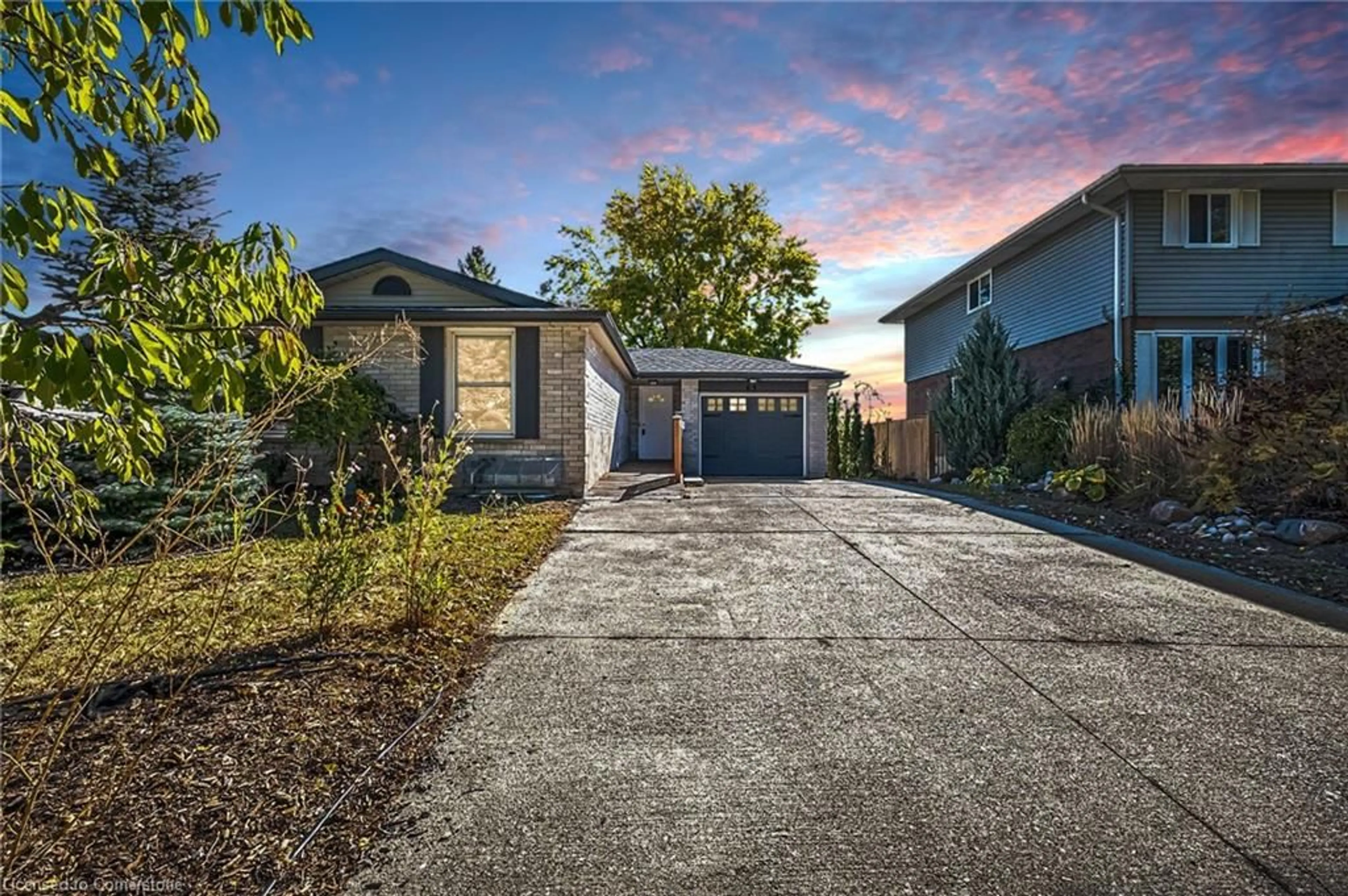 Frontside or backside of a home, the street view for 63 Wheatfield Cres, Kitchener Ontario N2P 1P7