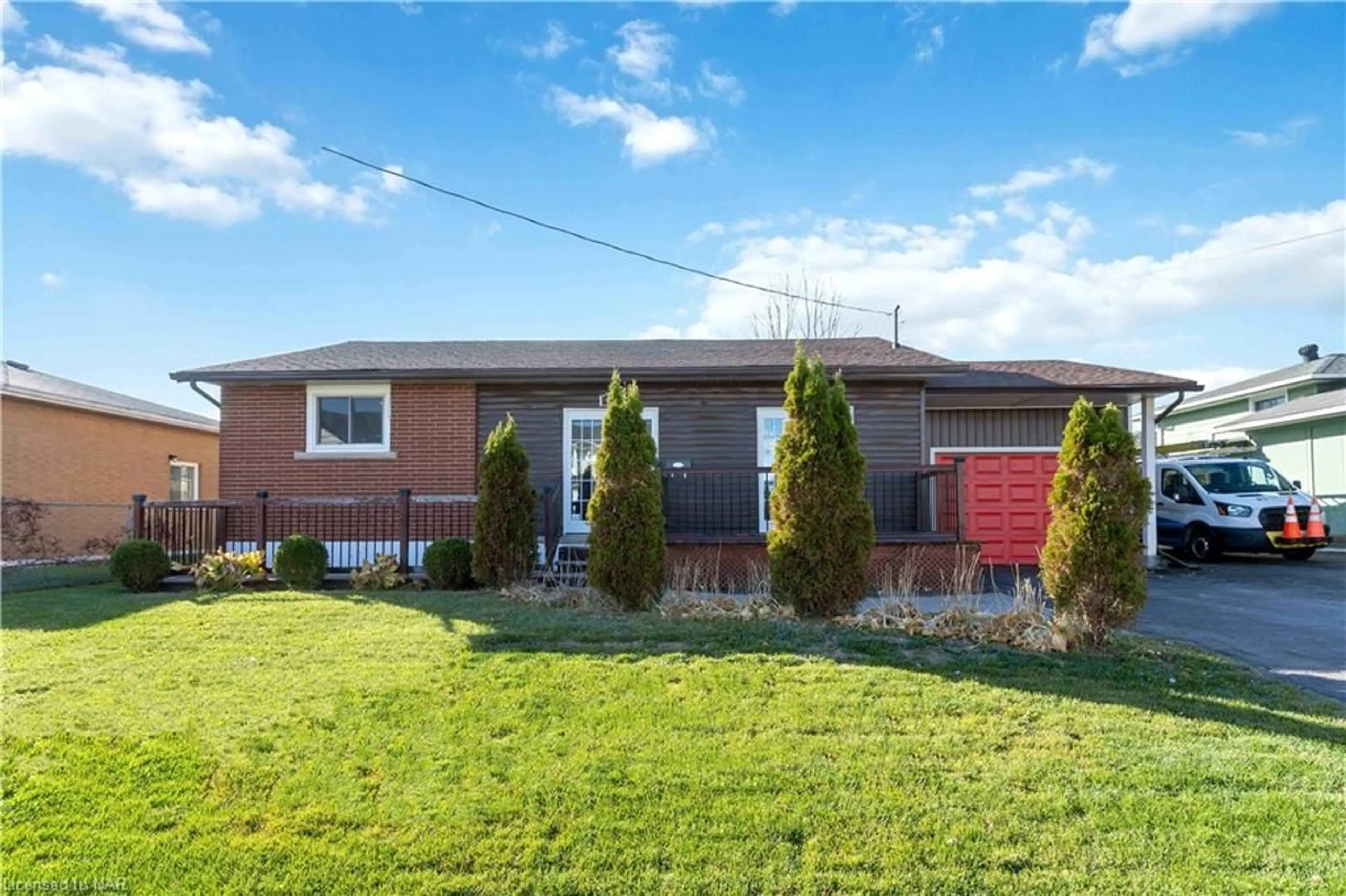 Frontside or backside of a home, the fenced backyard for 23 King St, Fort Erie Ontario L2A 3Z3