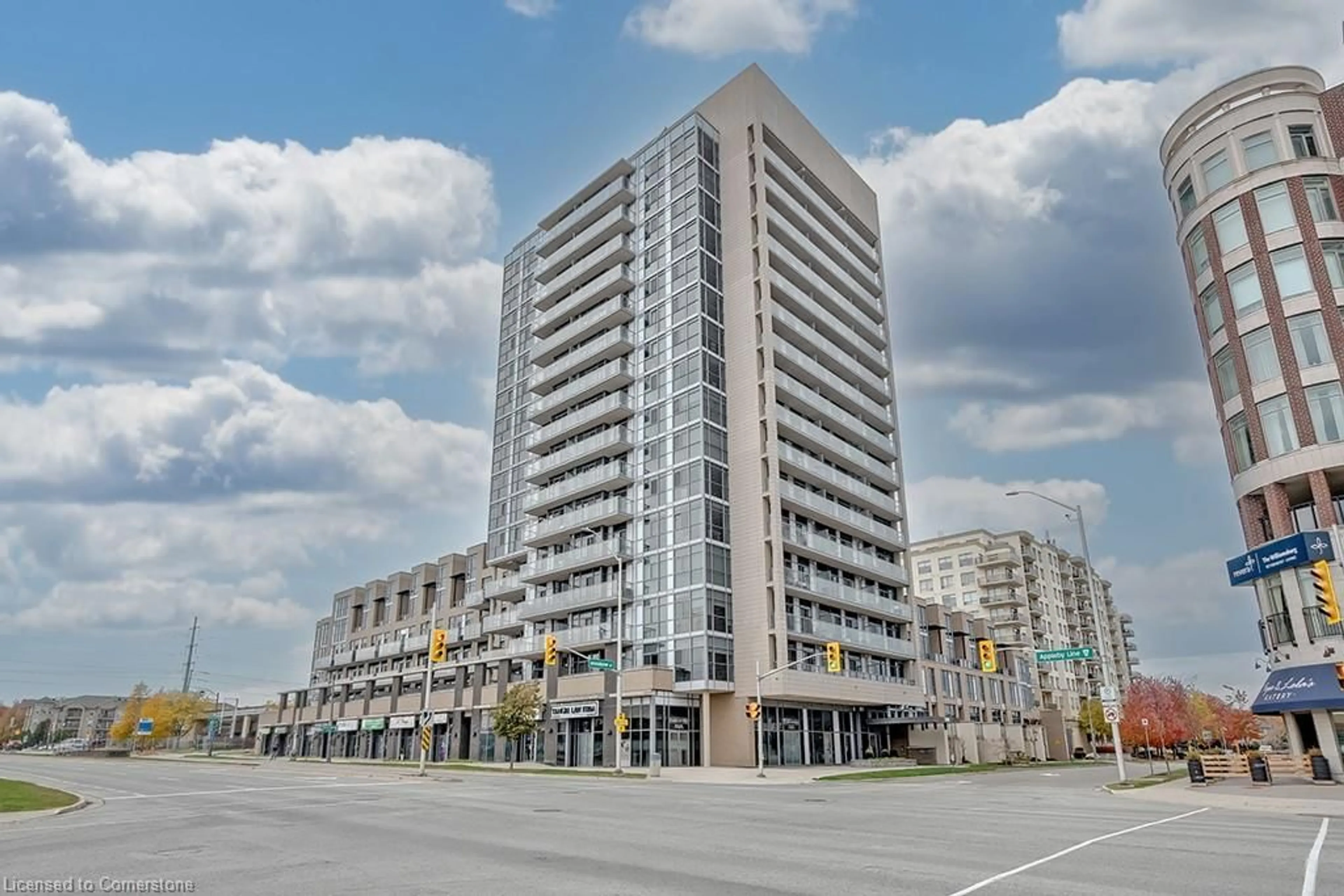 A pic from exterior of the house or condo, the front or back of building for 1940 Ironstone Dr #216, Burlington Ontario L7L 0E4