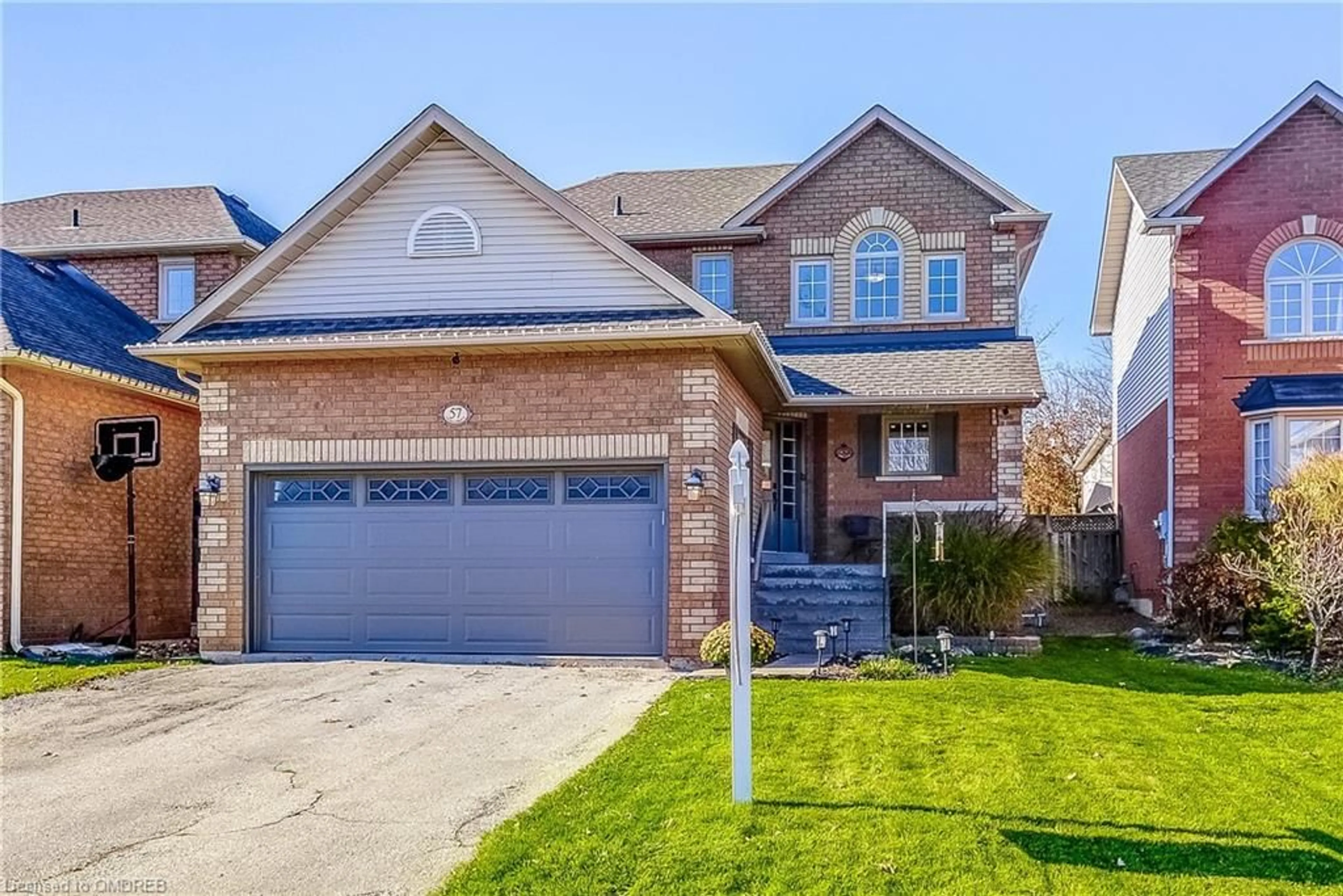 Frontside or backside of a home, the street view for 57 Niska Dr, Waterdown Ontario L0R 2H3