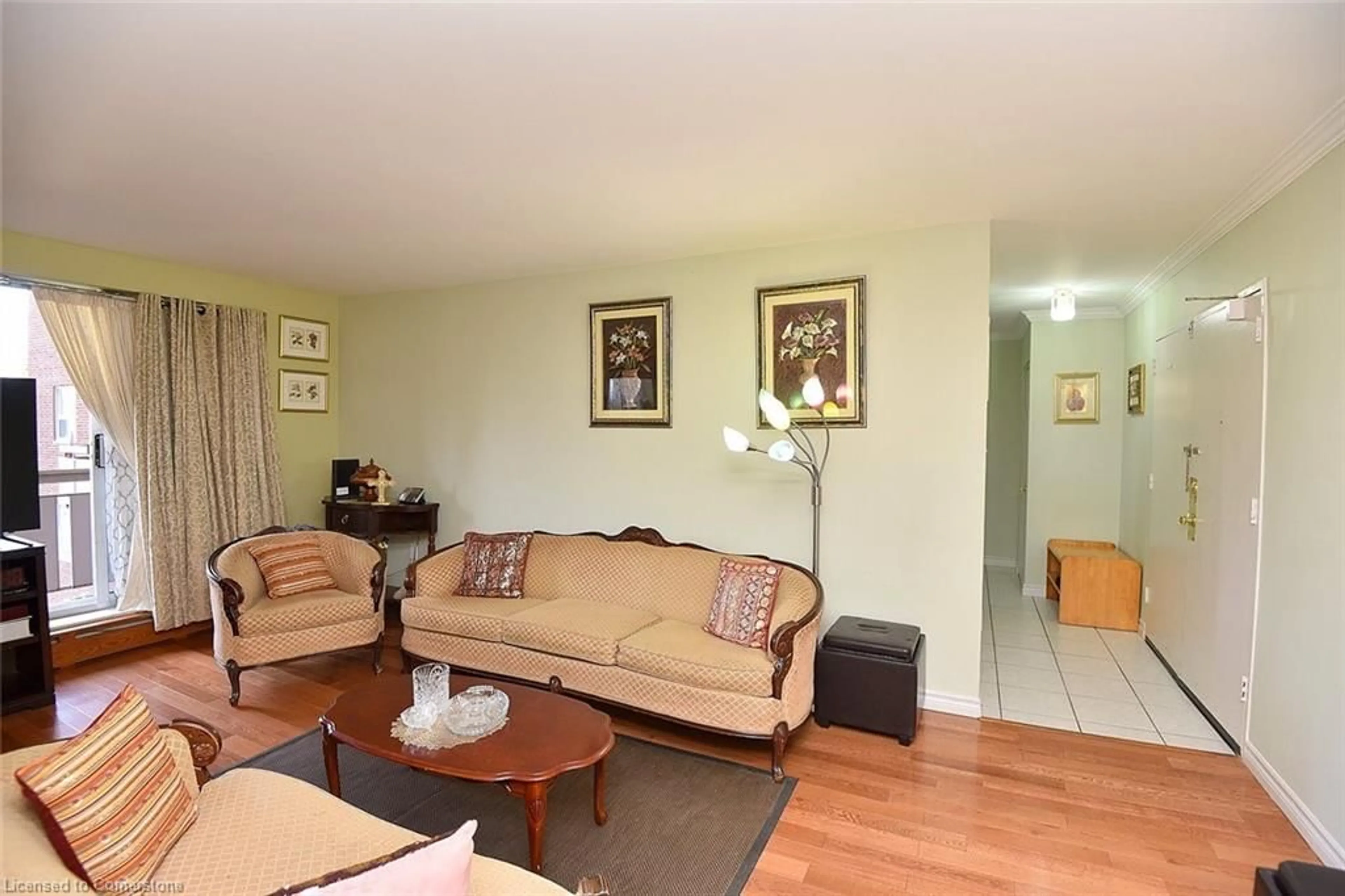 Living room, wood floors for 851 Queenston Rd #408, Stoney Creek Ontario L8G 1B4