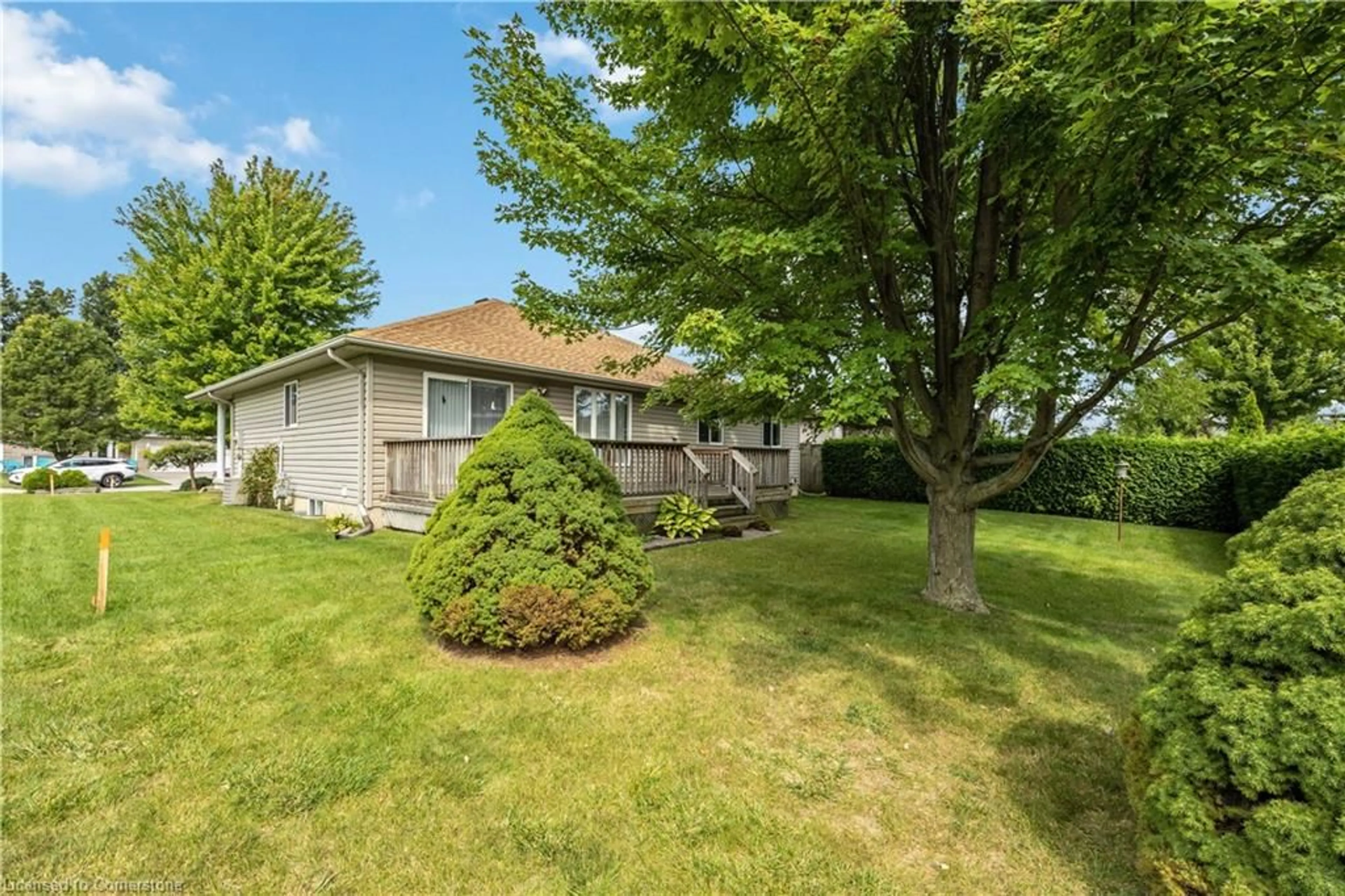 Frontside or backside of a home, the fenced backyard for 304 Parkside Dr, Petrolia Ontario N0P 1R0