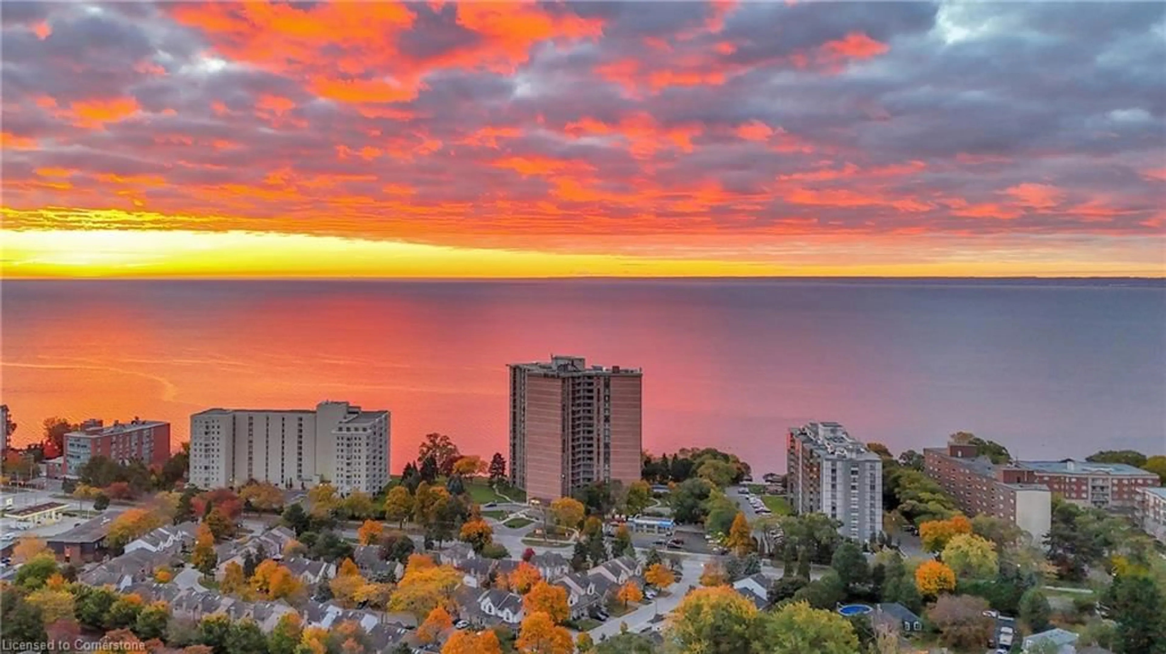 A pic from exterior of the house or condo, the view of city buildings for 5250 Lakeshore Rd #1603, Burlington Ontario L7L 5L2