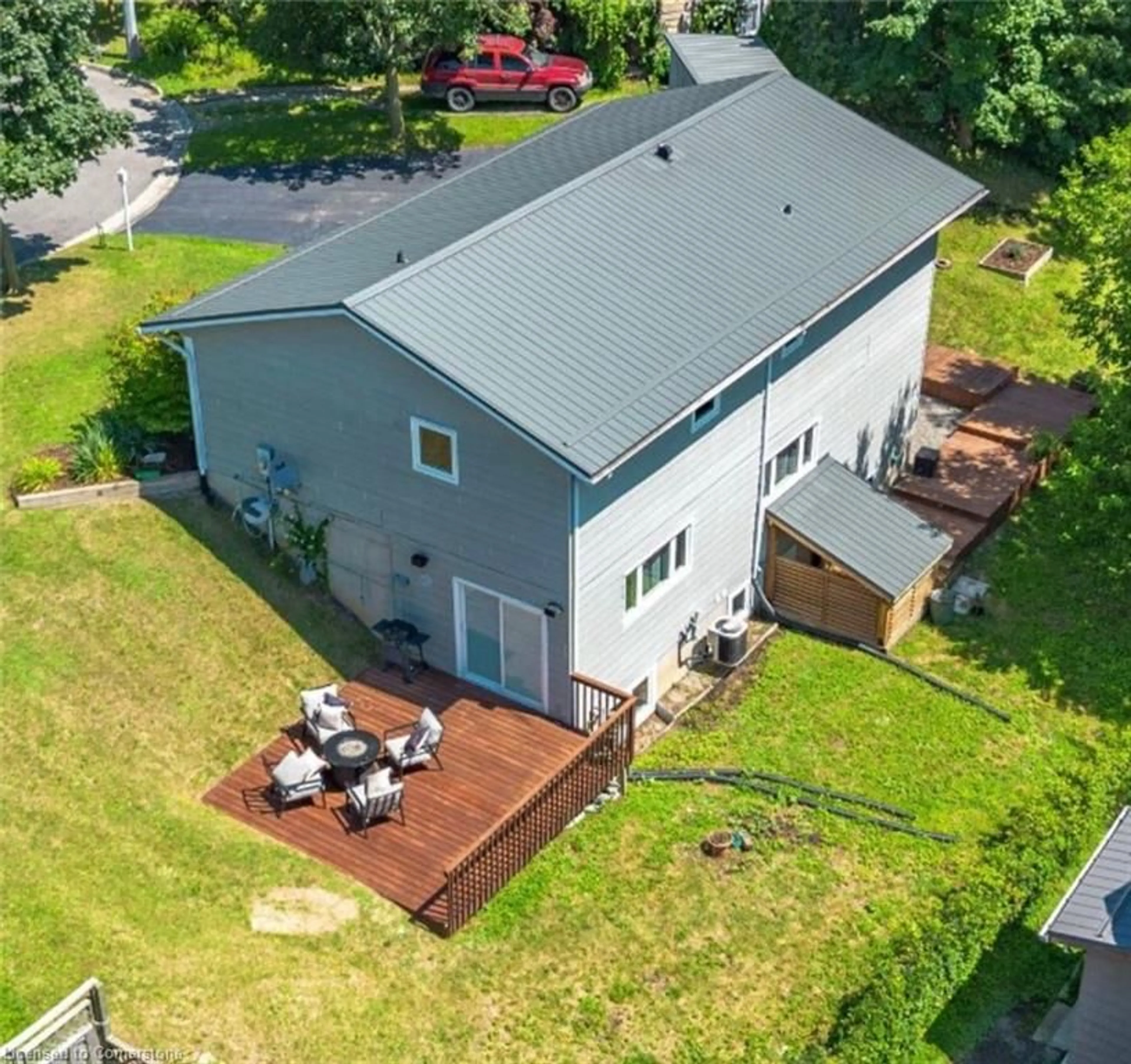 Frontside or backside of a home, the fenced backyard for 25 Stephens Crt, Simcoe Ontario N3Y 4S8