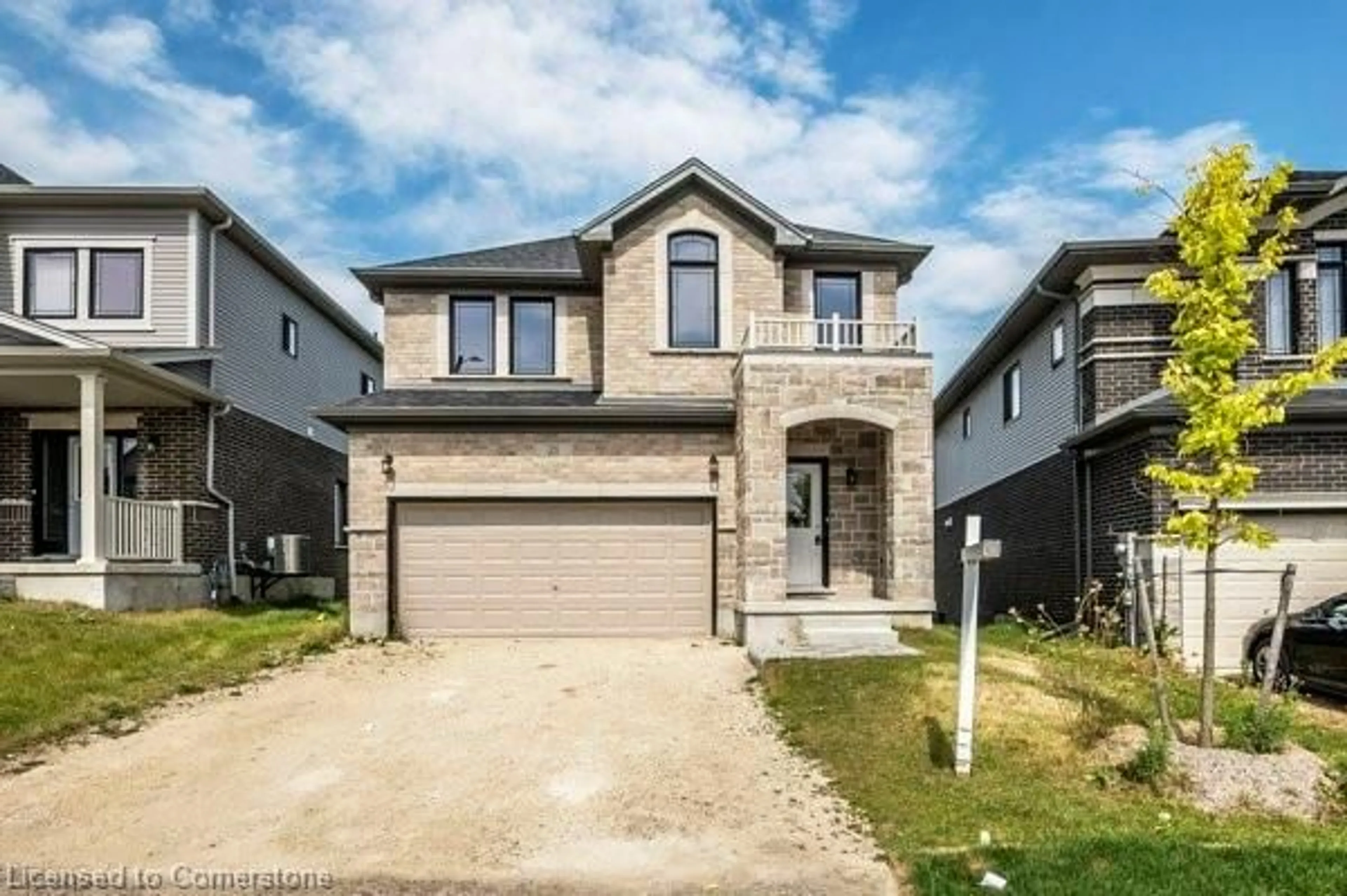 Frontside or backside of a home, the street view for 21 Harrington Rd, Guelph Ontario N1E 0S1