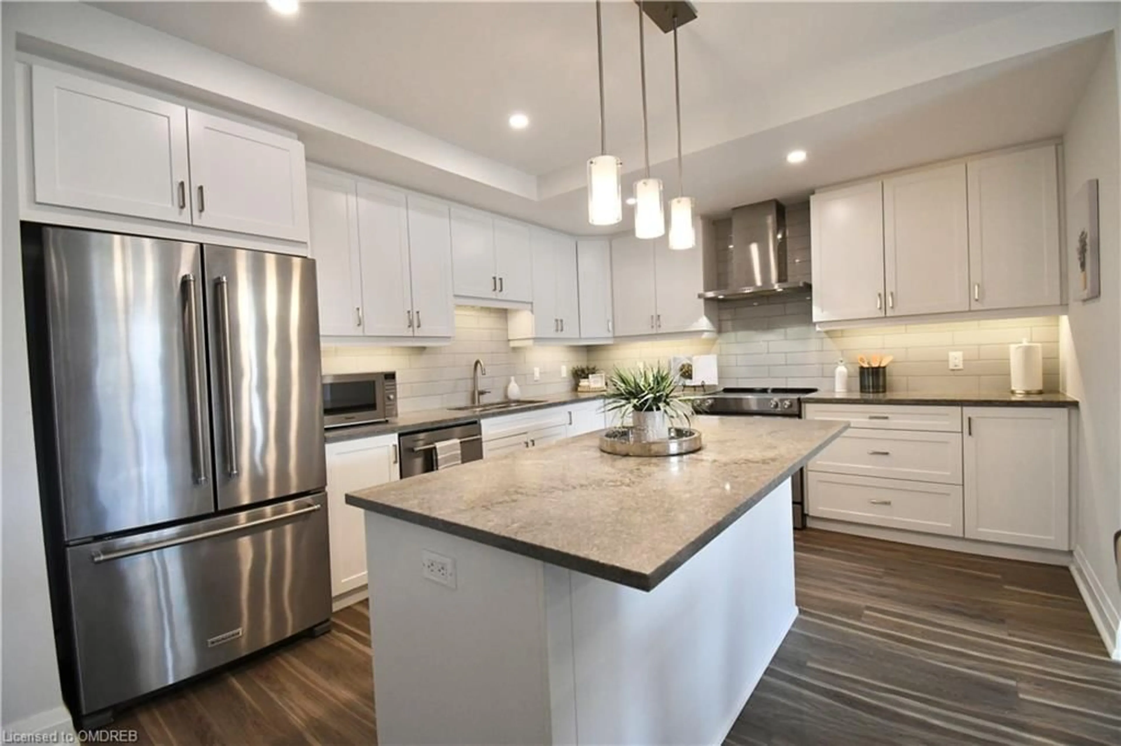 Open concept kitchen for 249 Grey Silo Rd #201, Waterloo Ontario N2K 0G8