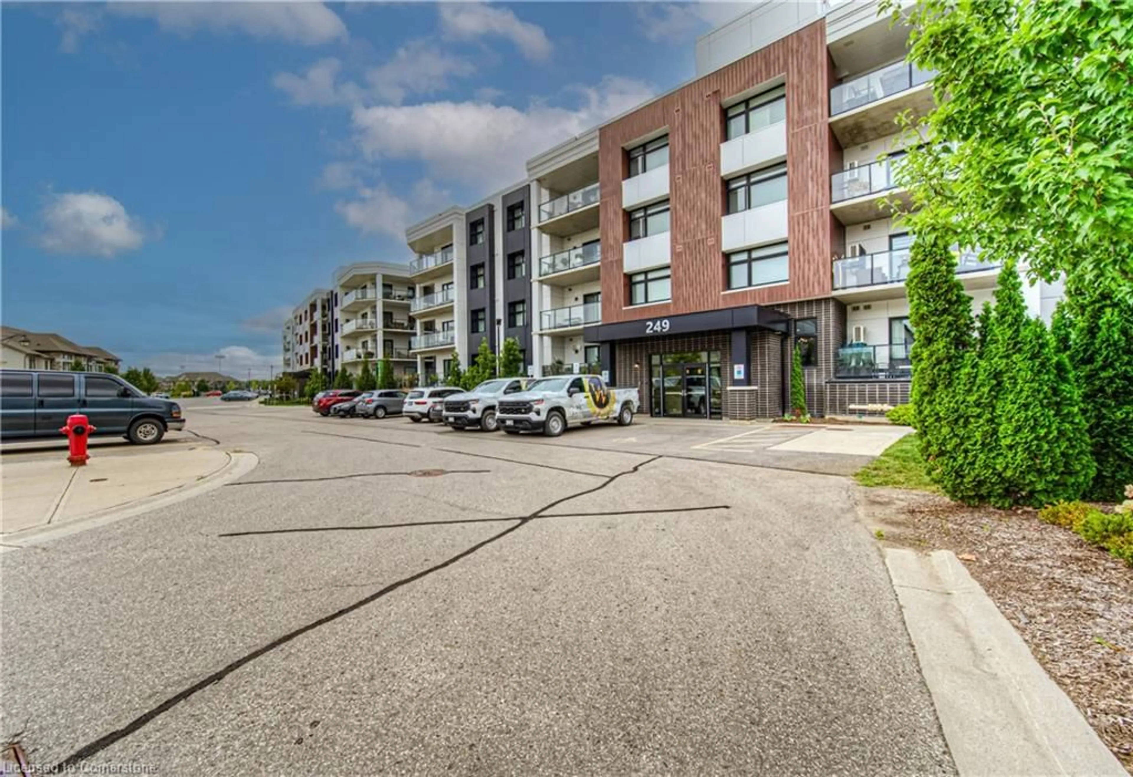 A pic from exterior of the house or condo, the street view for 249 Grey Silo Rd #108, Waterloo Ontario N2K 0G8