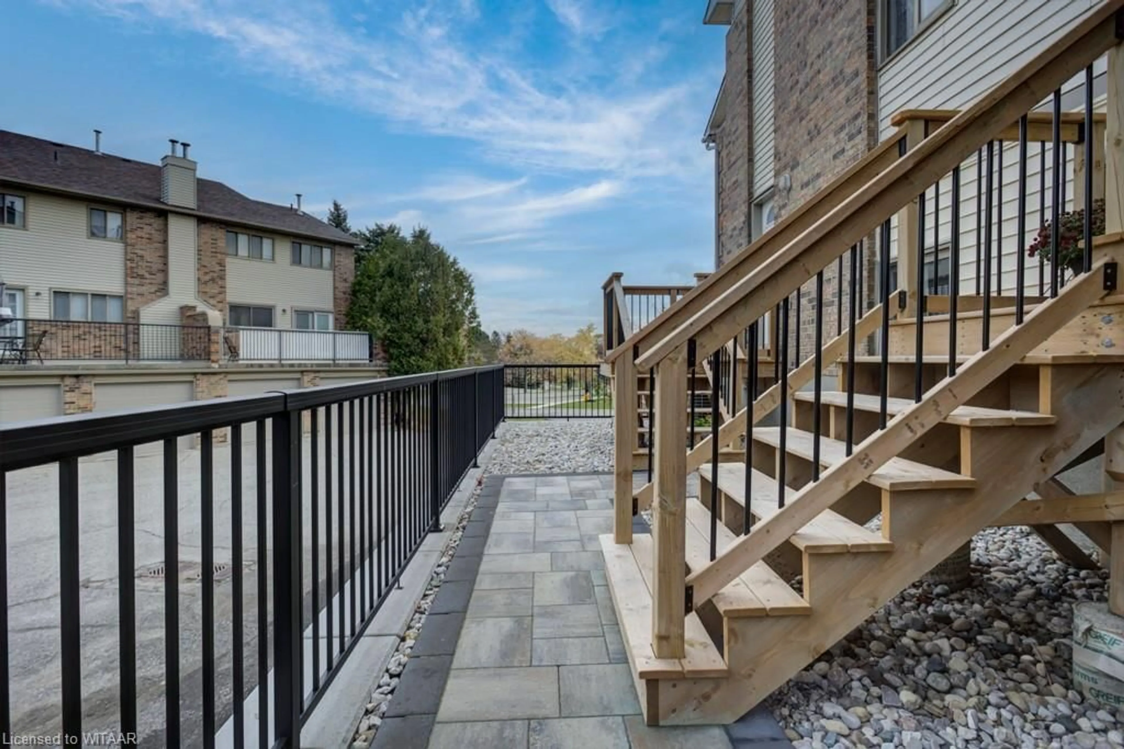 Patio, the fenced backyard for 3-21 Wren Crt, Tillsonburg Ontario N4G 5K2