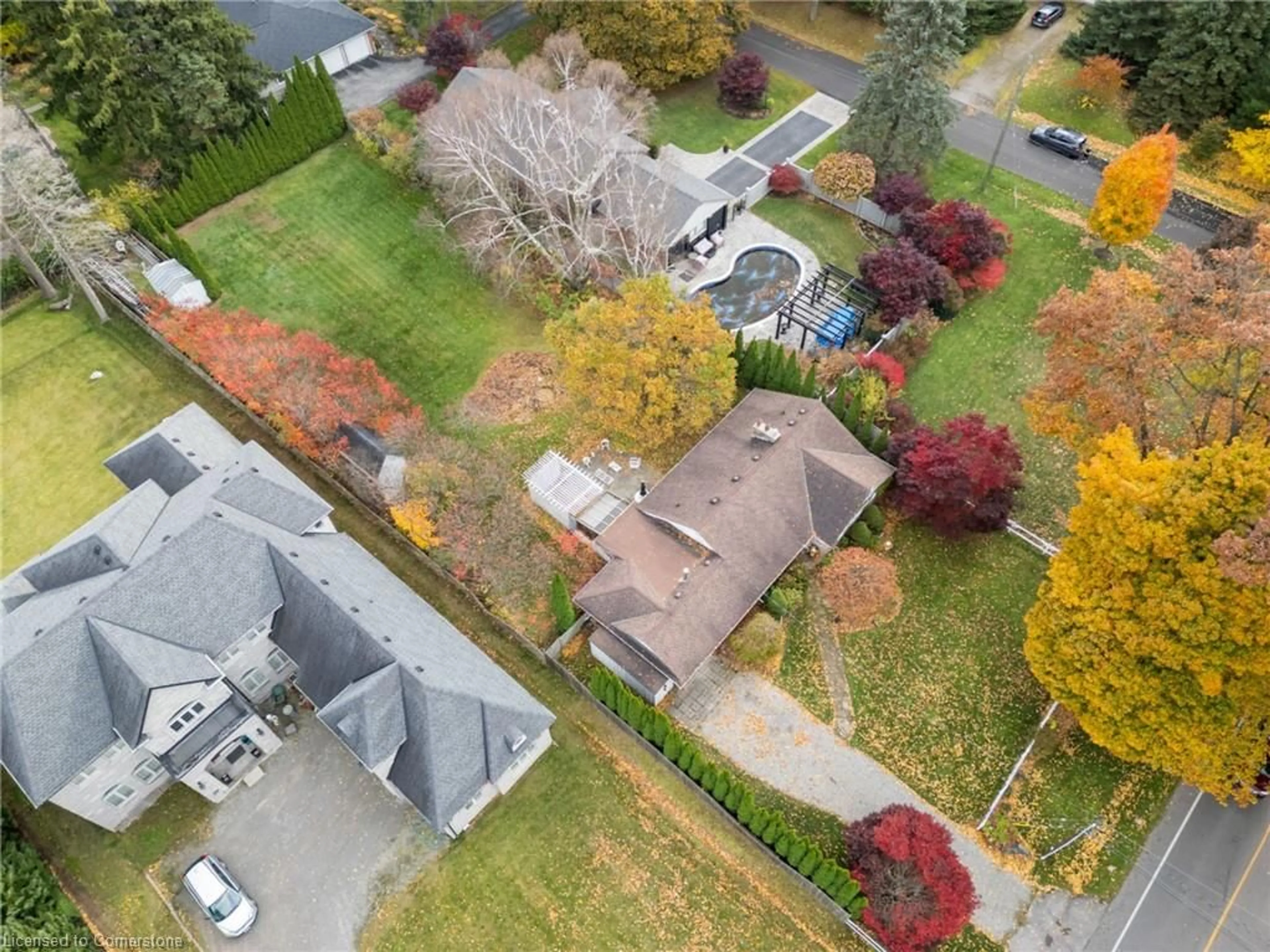 Frontside or backside of a home, the fenced backyard for 53 Lovers Lane, Ancaster Ontario L9G 1G5