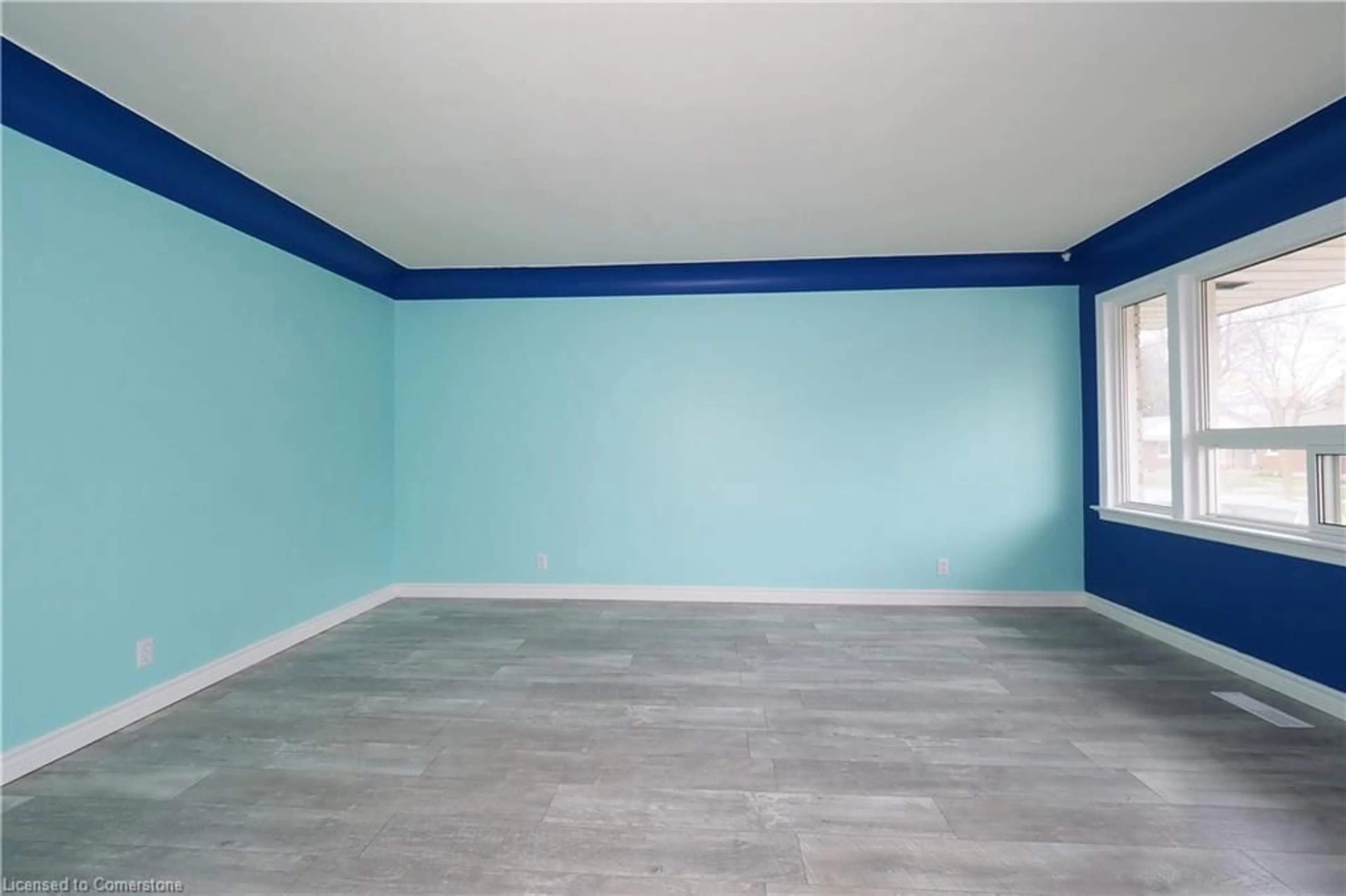 A pic of a room, cement floor for 134 Patricia Ave, Kitchener Ontario N2M 1J6