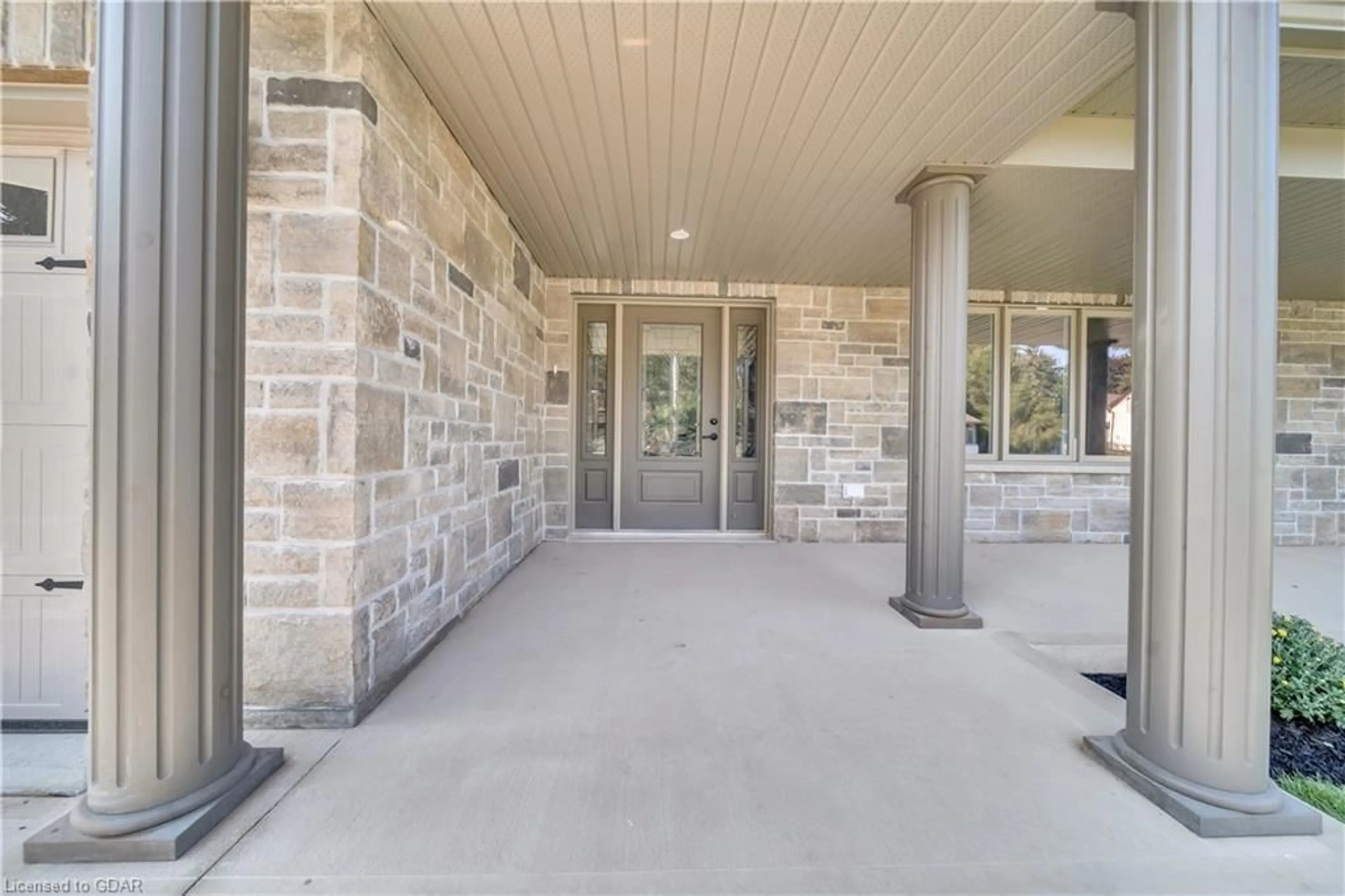 Indoor entryway, cement floor for 92 & 94 King St, Harriston Ontario N0G 1Z0