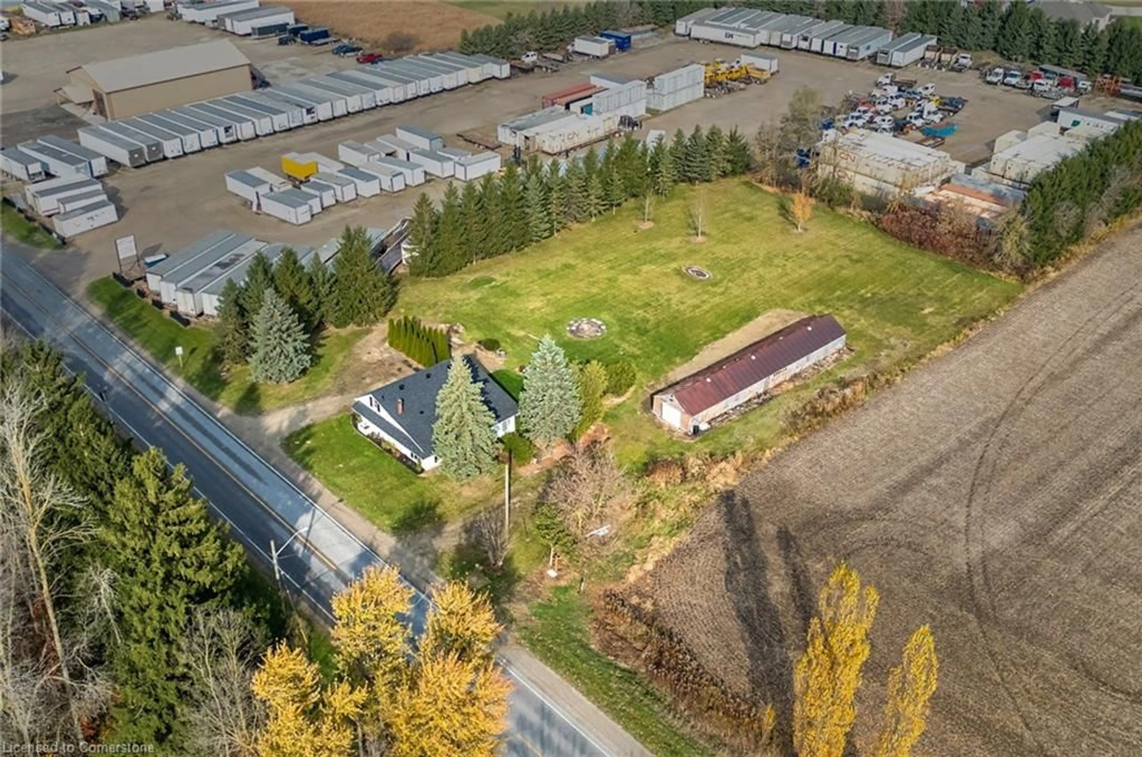 A pic from exterior of the house or condo, the fenced backyard for 895 King St, Palmerston Ontario N0G 2P0