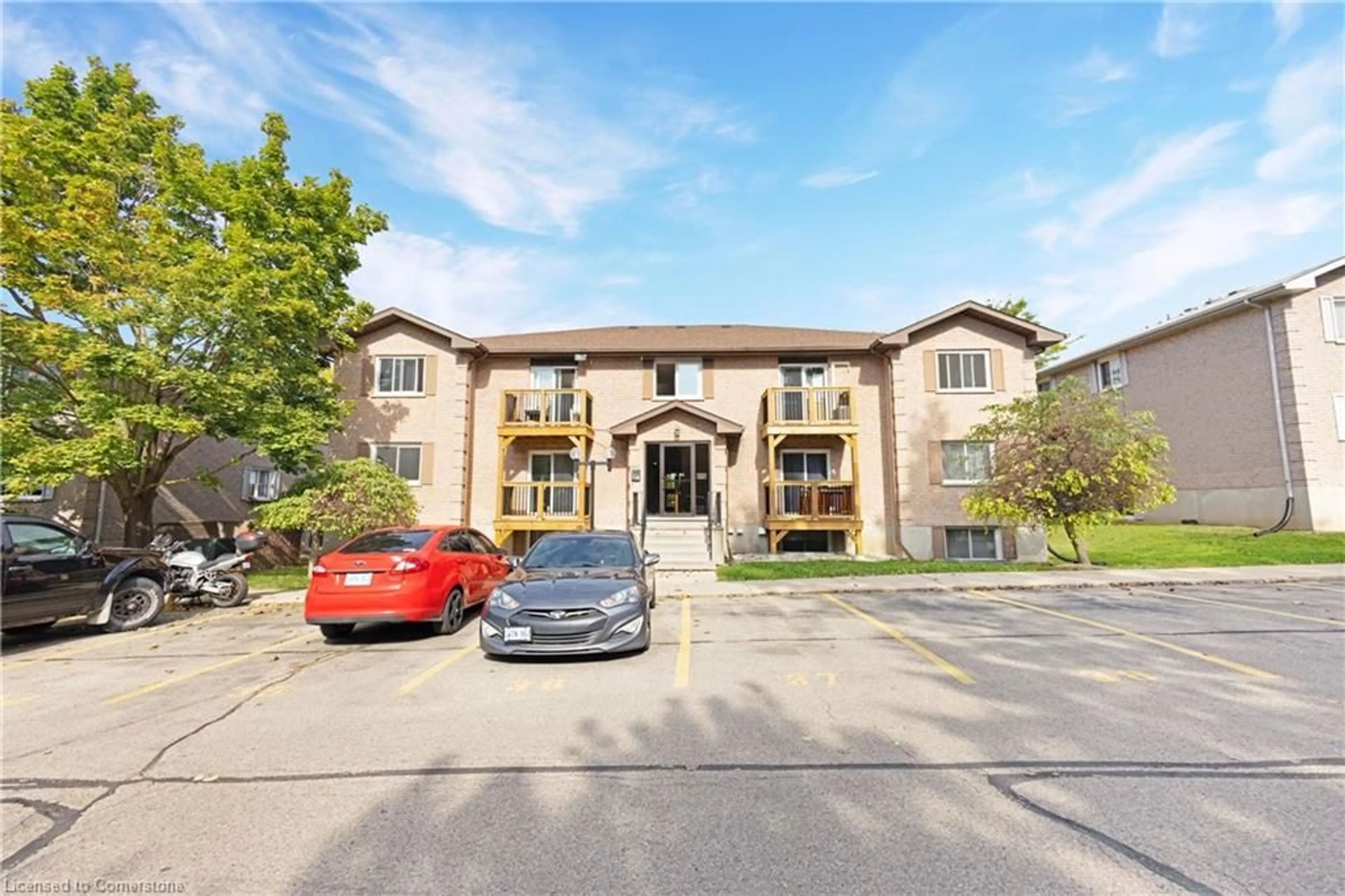 A pic from exterior of the house or condo, the street view for 266 Overlea Dr #303, Kitchener Ontario N2M 5N2