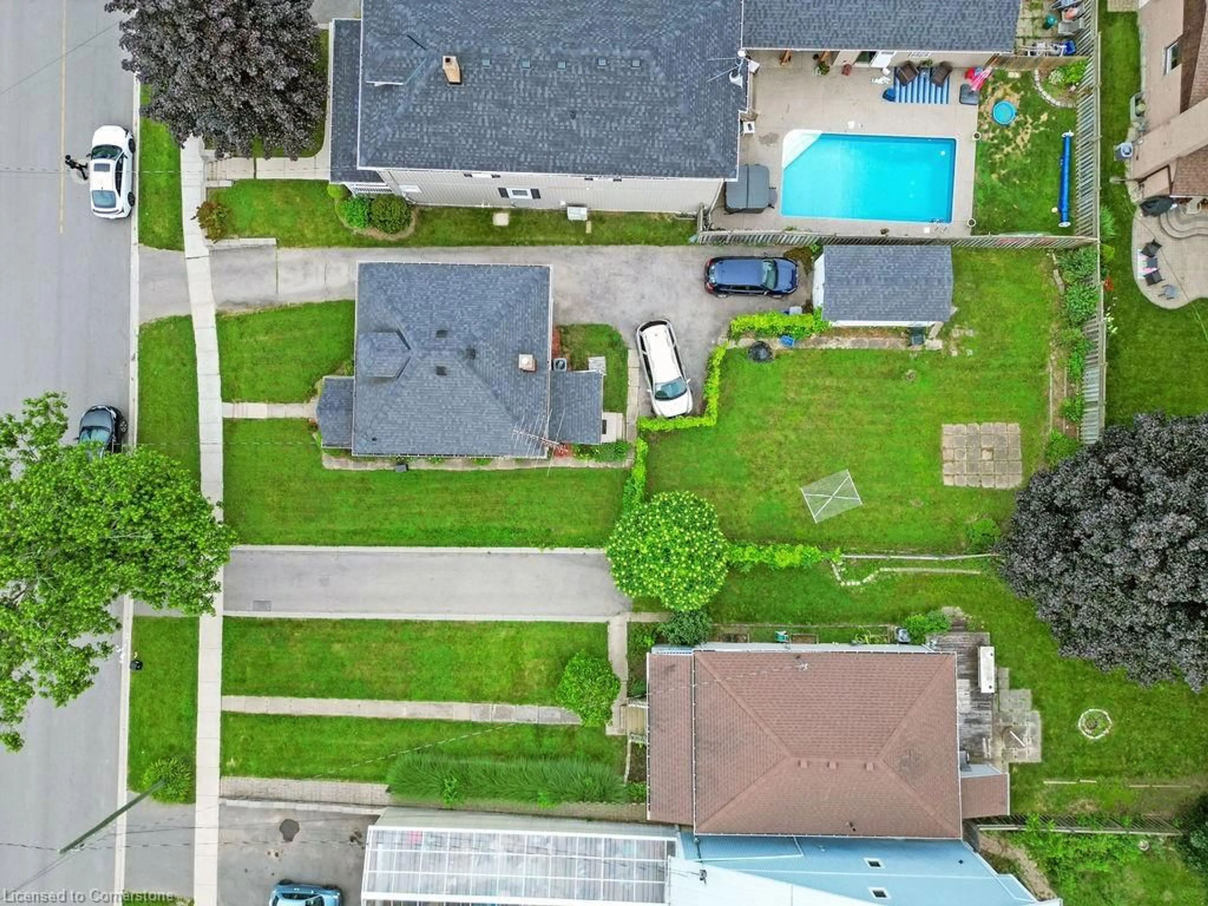 Frontside or backside of a home, the fenced backyard for 151 Orkney St, Caledonia Ontario N3W 2N4