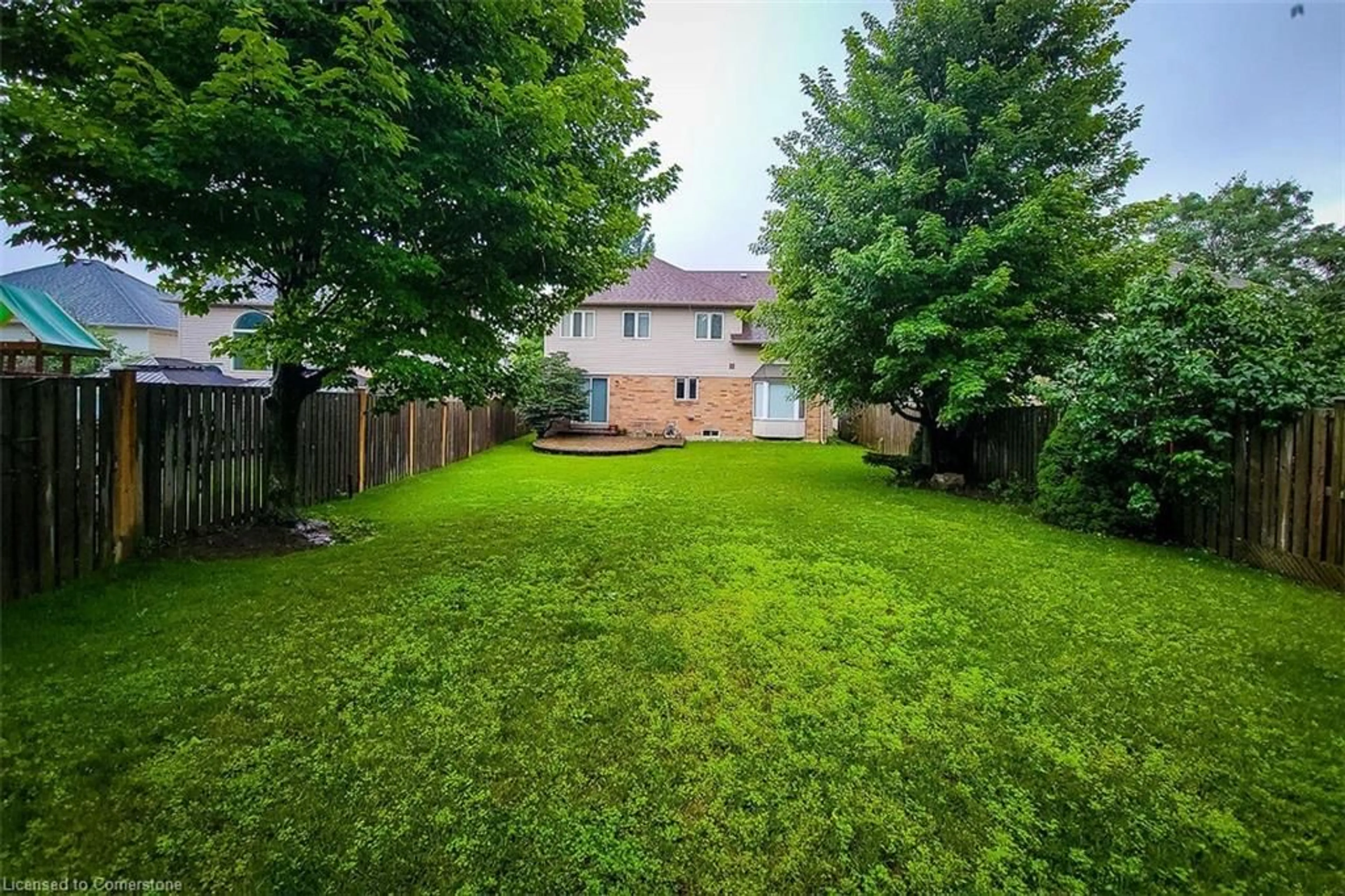 Patio, the fenced backyard for 88 Cabriolet Cres, Ancaster Ontario L9K 1K6