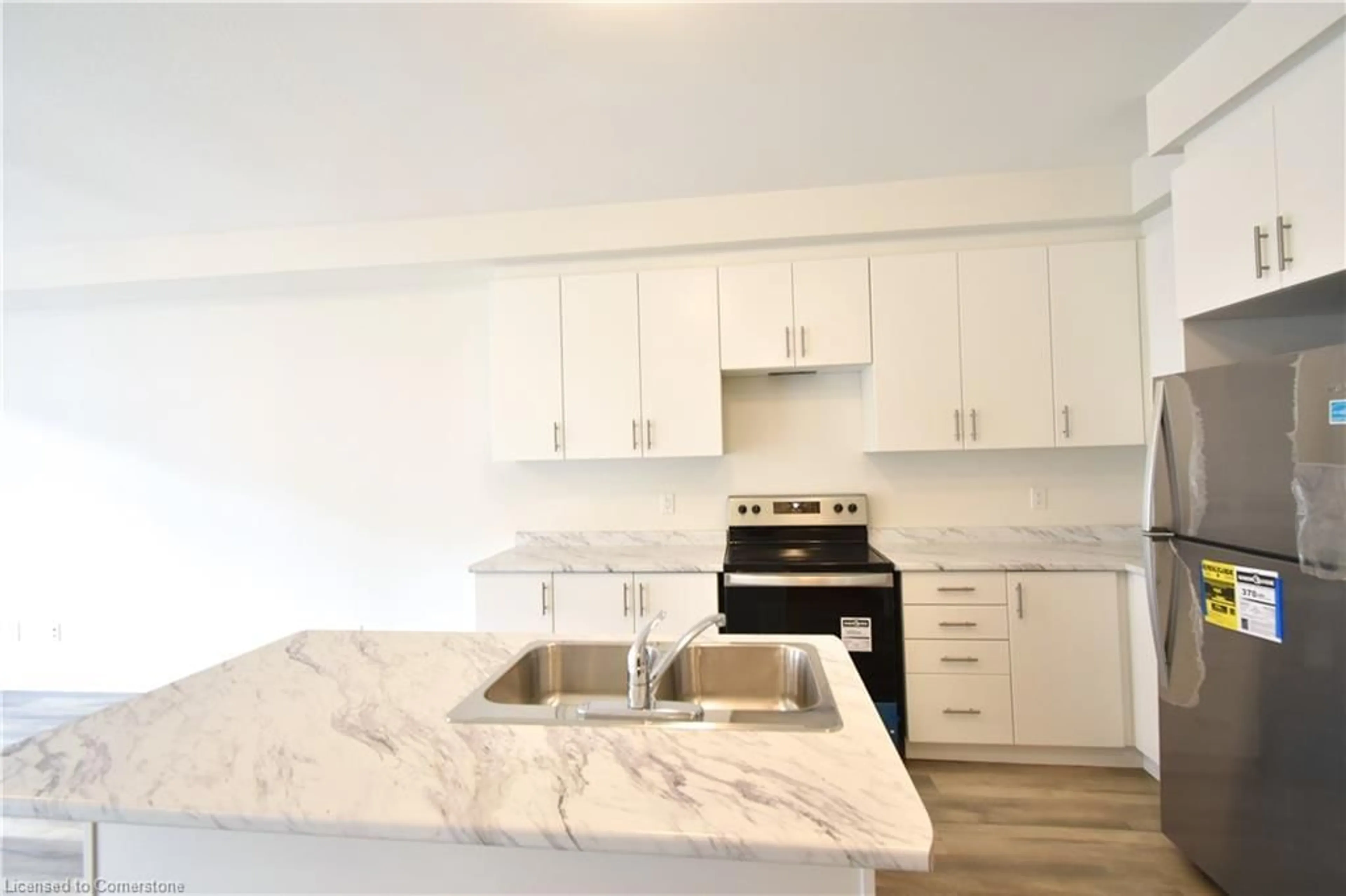 Open concept kitchen for 40 Zinfandel Dr #48, Hamilton Ontario L8E 0L1