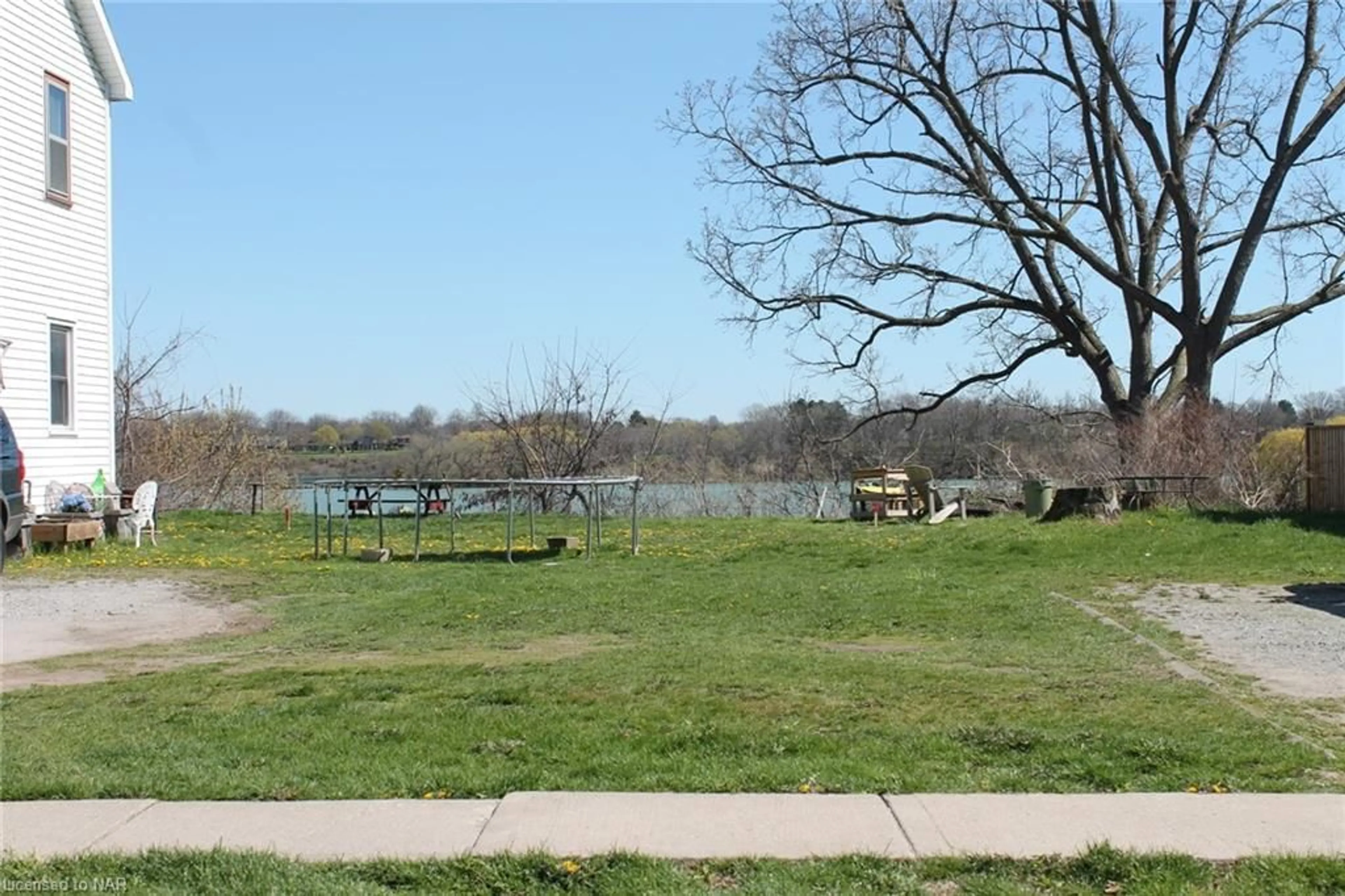 Patio, the fenced backyard for 115A Main St, St. Catharines Ontario L2N 4V3