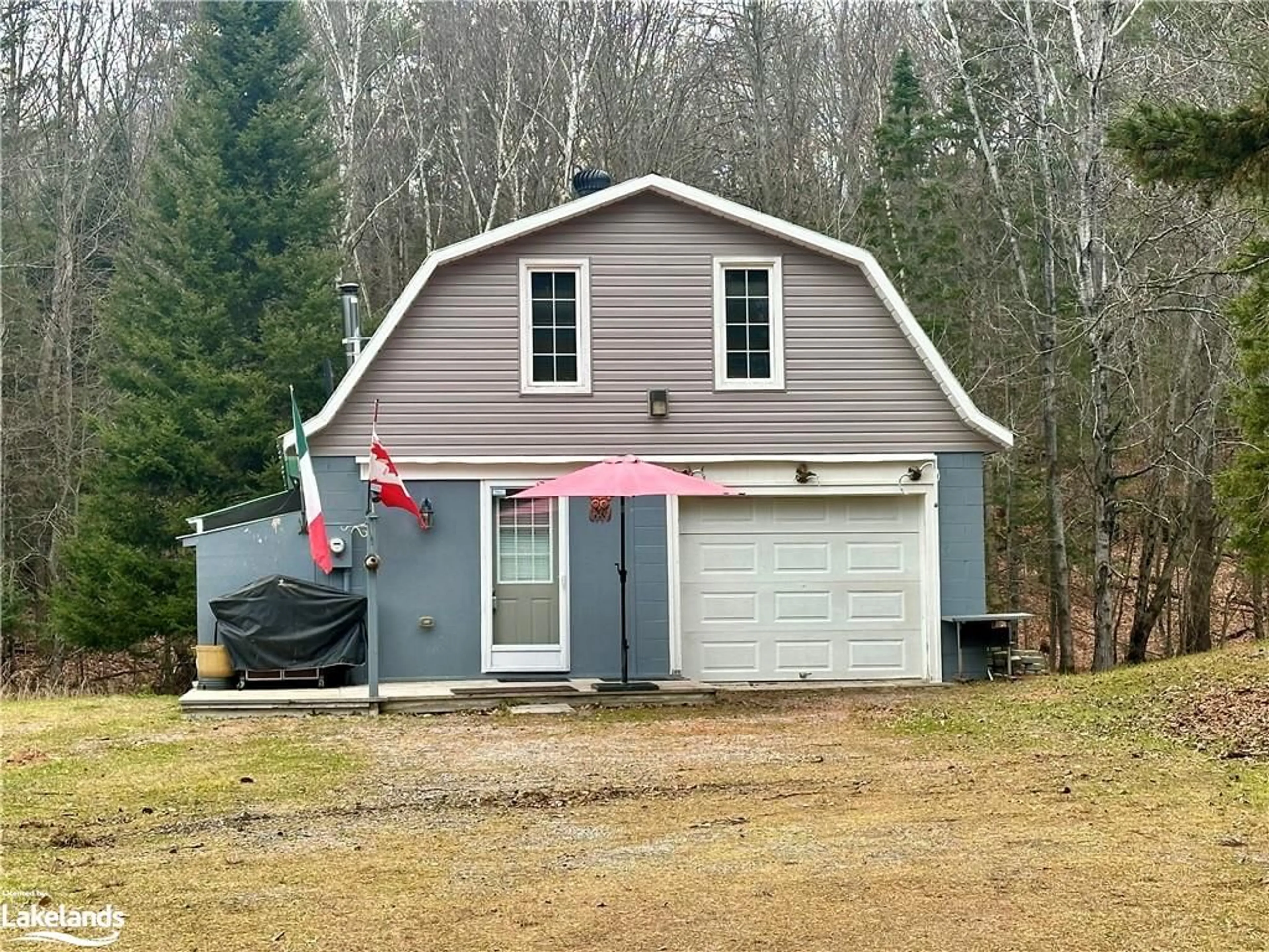 Frontside or backside of a home, cottage for 112 Highway 510, Magnetawan Ontario P0A 1P0