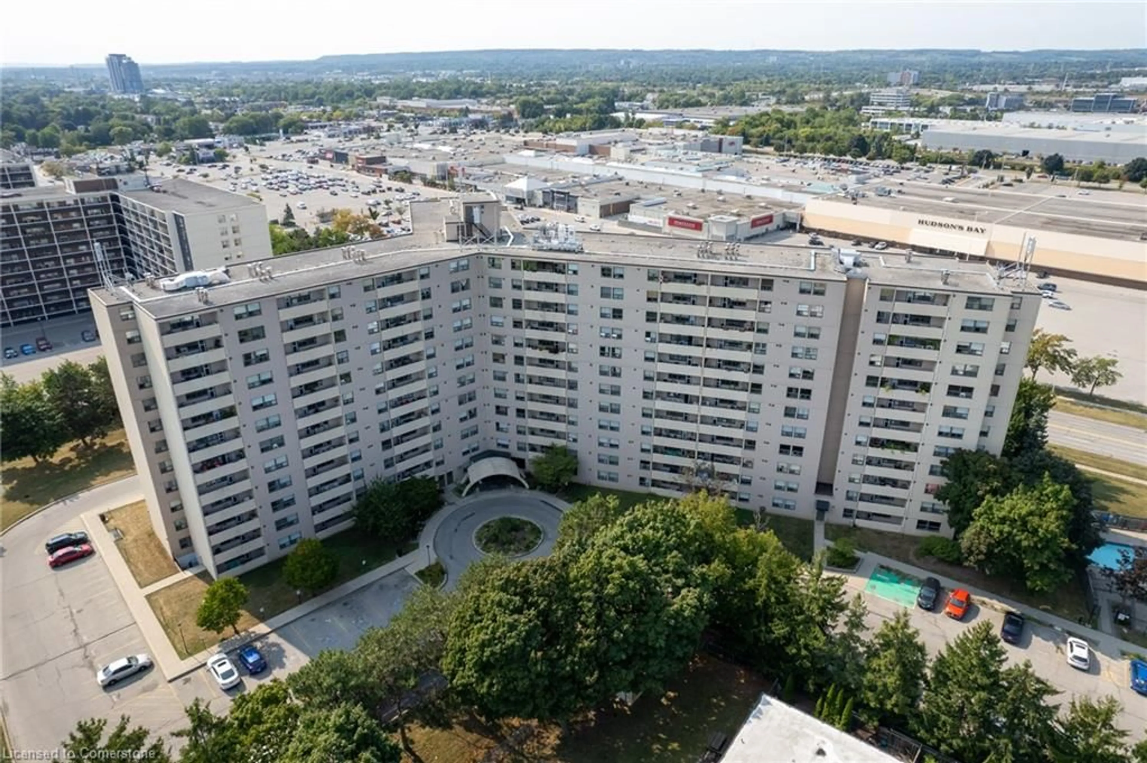 A pic from exterior of the house or condo, the view of city buildings for 700 Dynes Rd #109, Burlington Ontario L7N 3M2