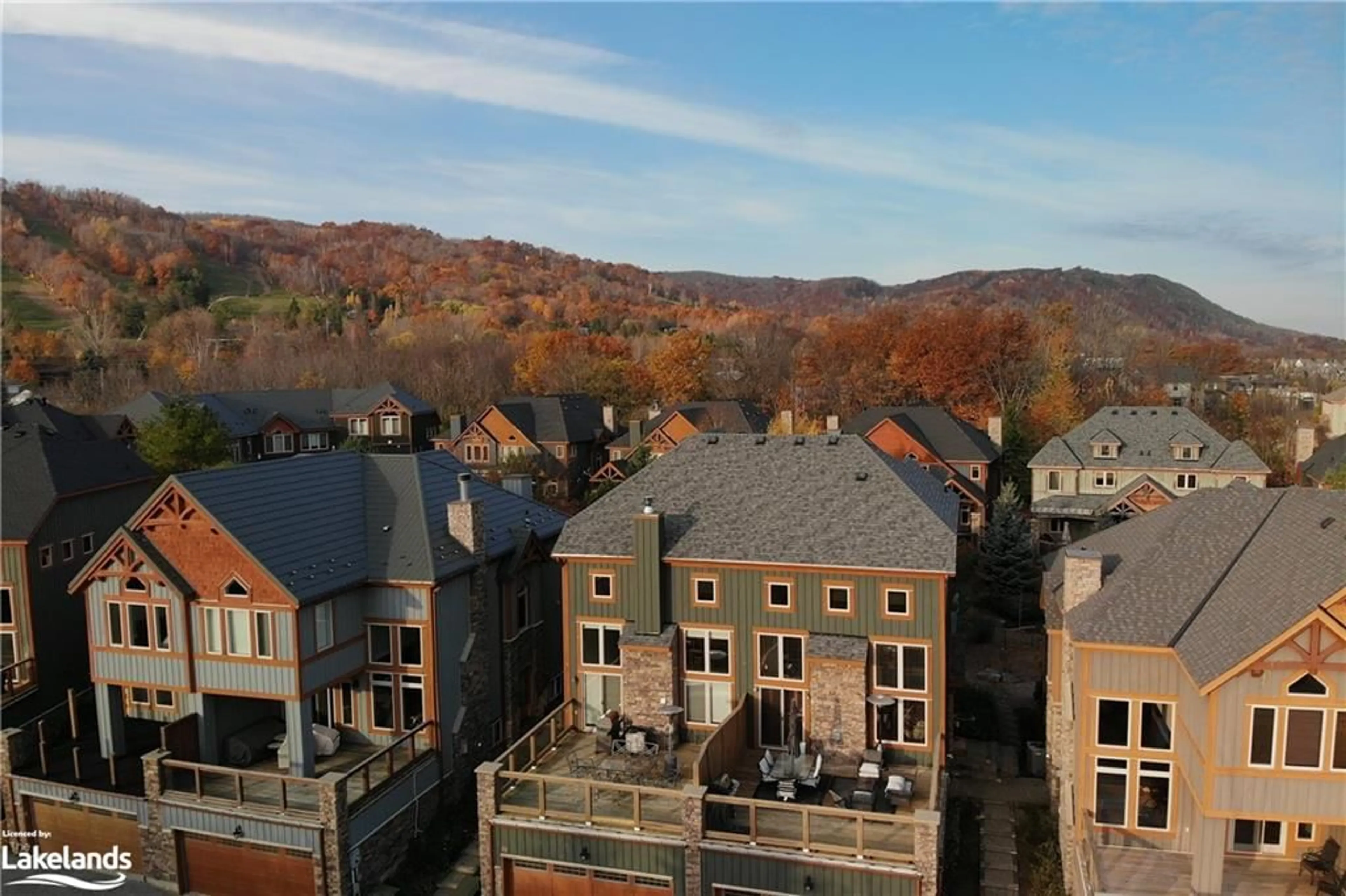 A pic from exterior of the house or condo, the view of city buildings for 214 Blueski George Cres #32, The Blue Mountains Ontario L9Y 0V5