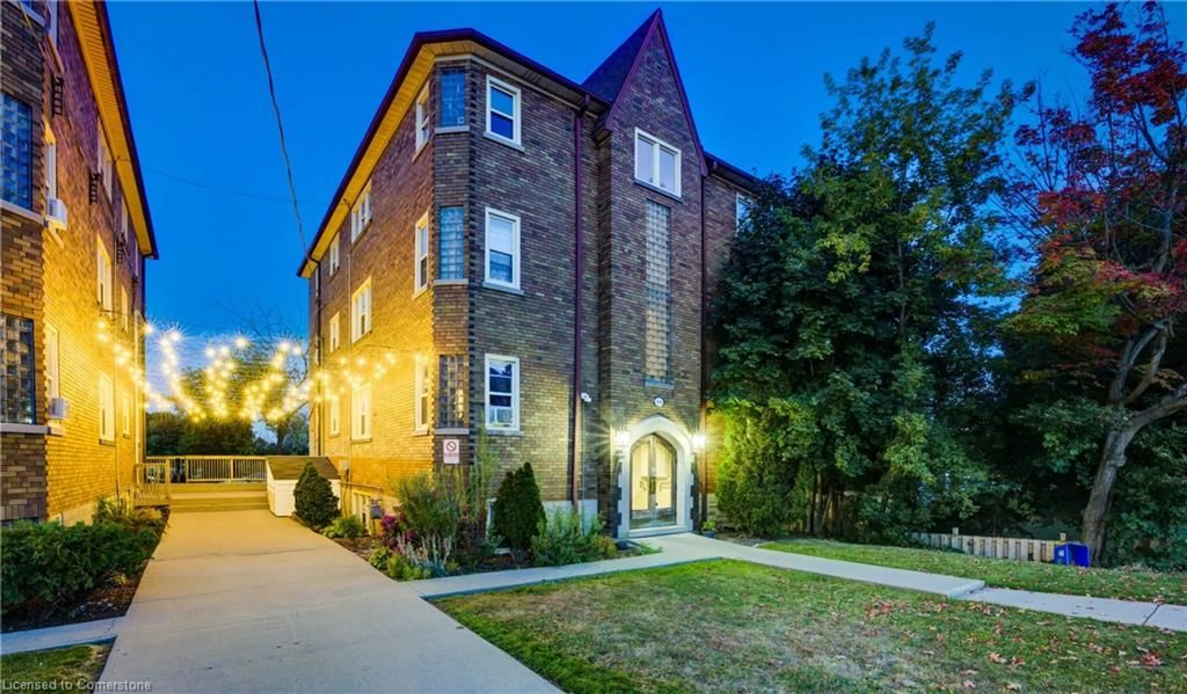 A pic from exterior of the house or condo, the fenced backyard for 100 & 104 Margaret Ave, Kitchener Ontario N2H 4H6