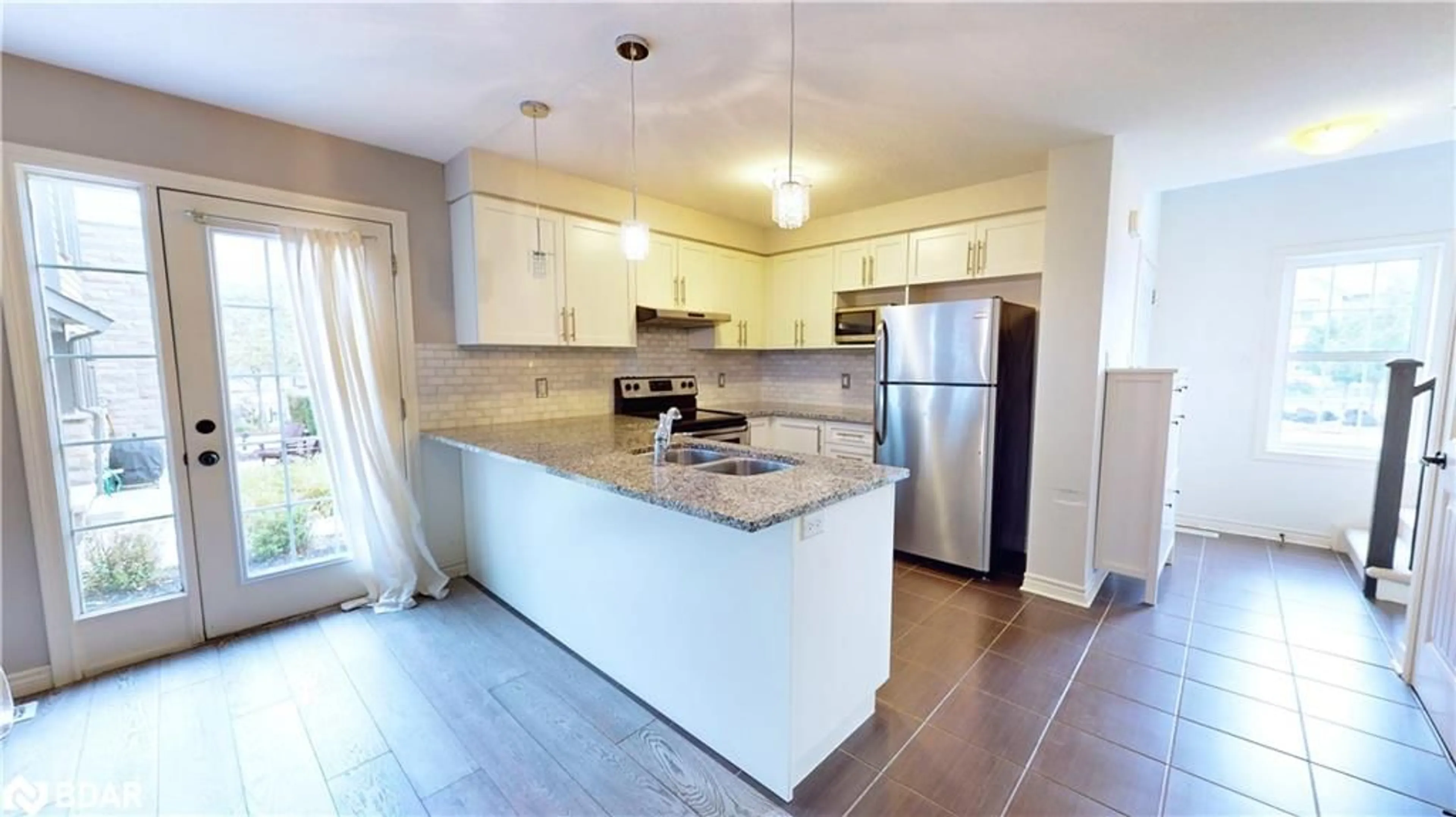 Open concept kitchen for 101 Frederick Dr #1, Guelph Ontario N1L 0K7