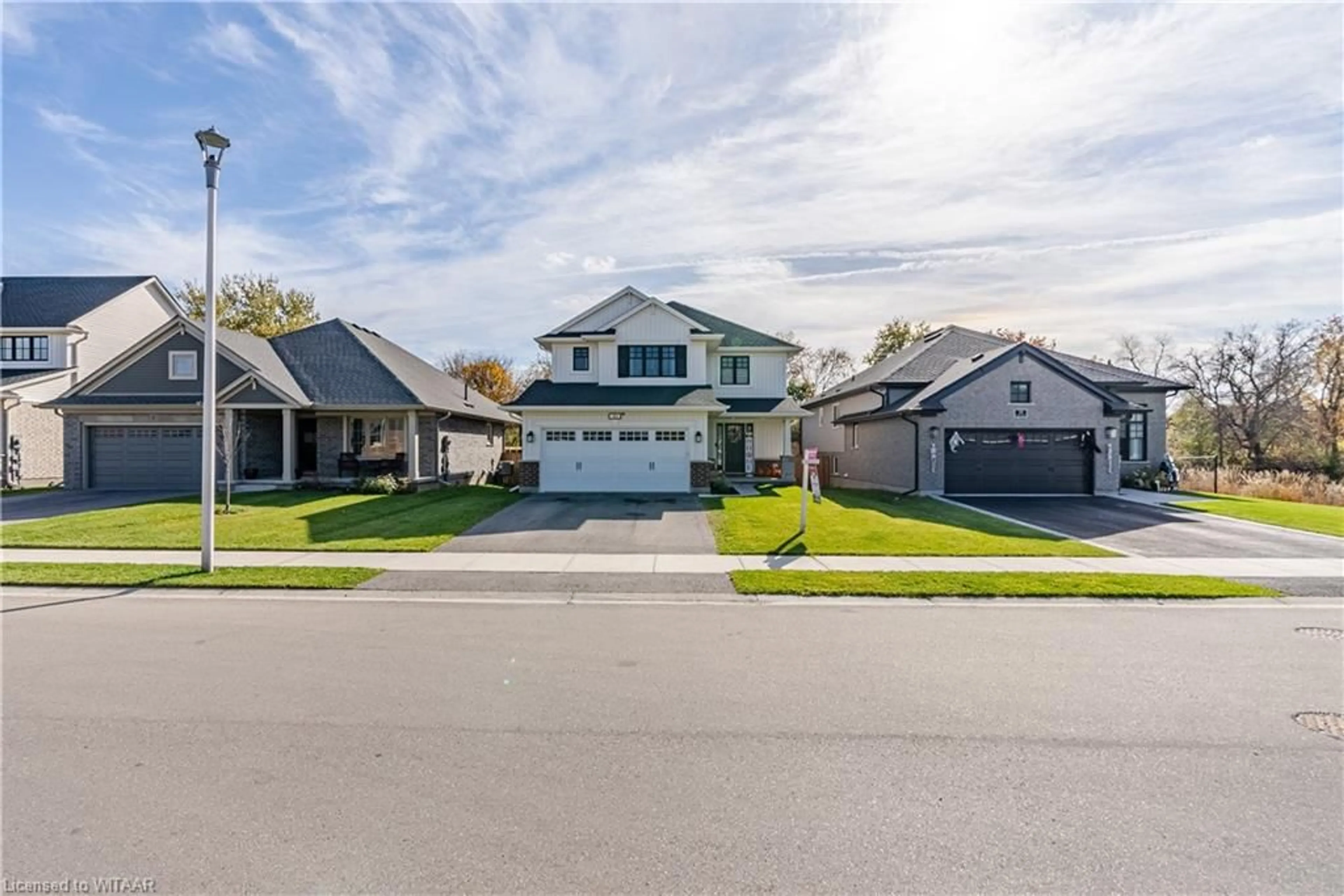 Frontside or backside of a home, the street view for 40 Livingston Dr, Tillsonburg Ontario N4G 0J3