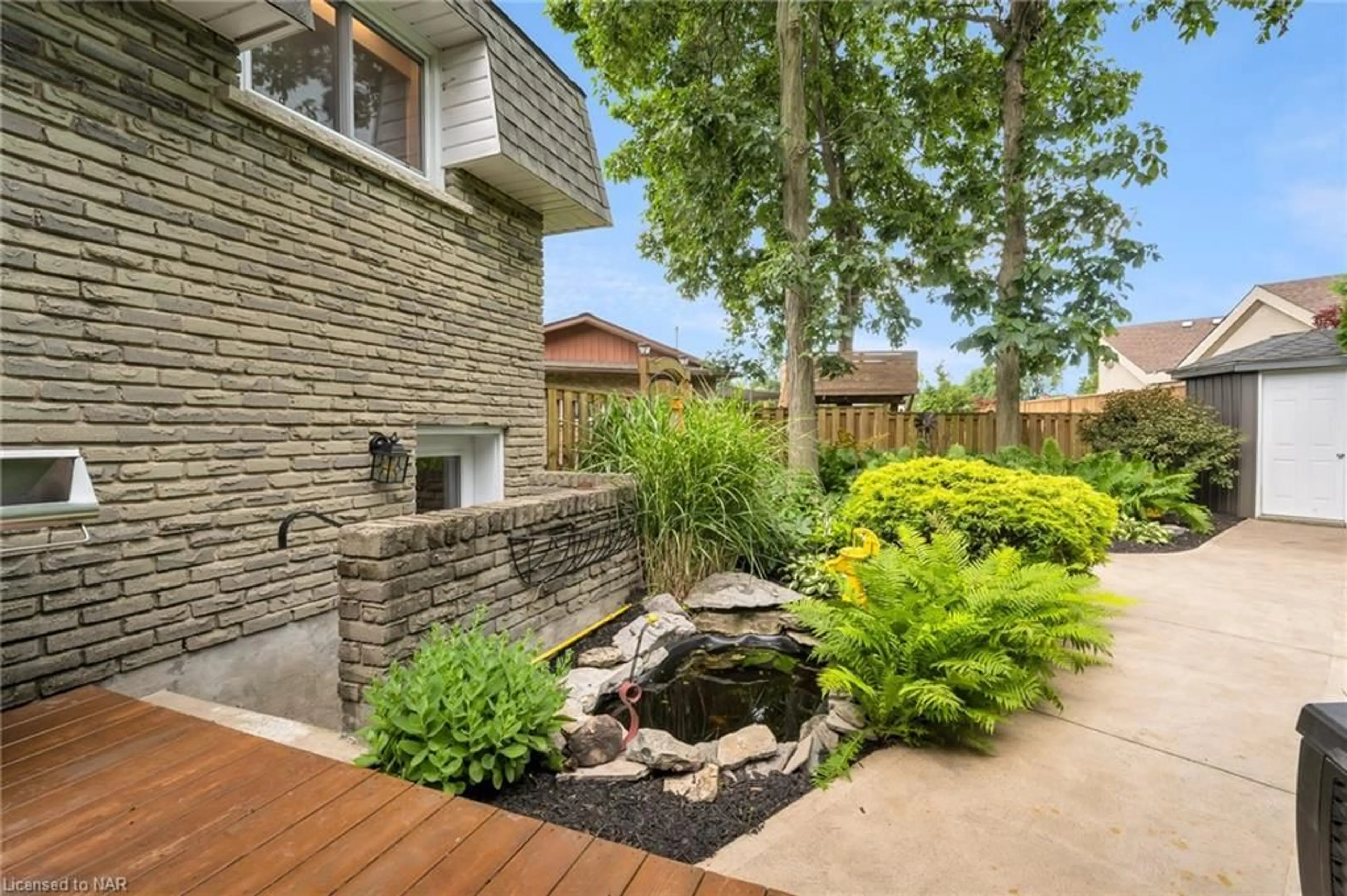 Patio, the fenced backyard for 19 Little John Crt, Welland Ontario L3C 5X3