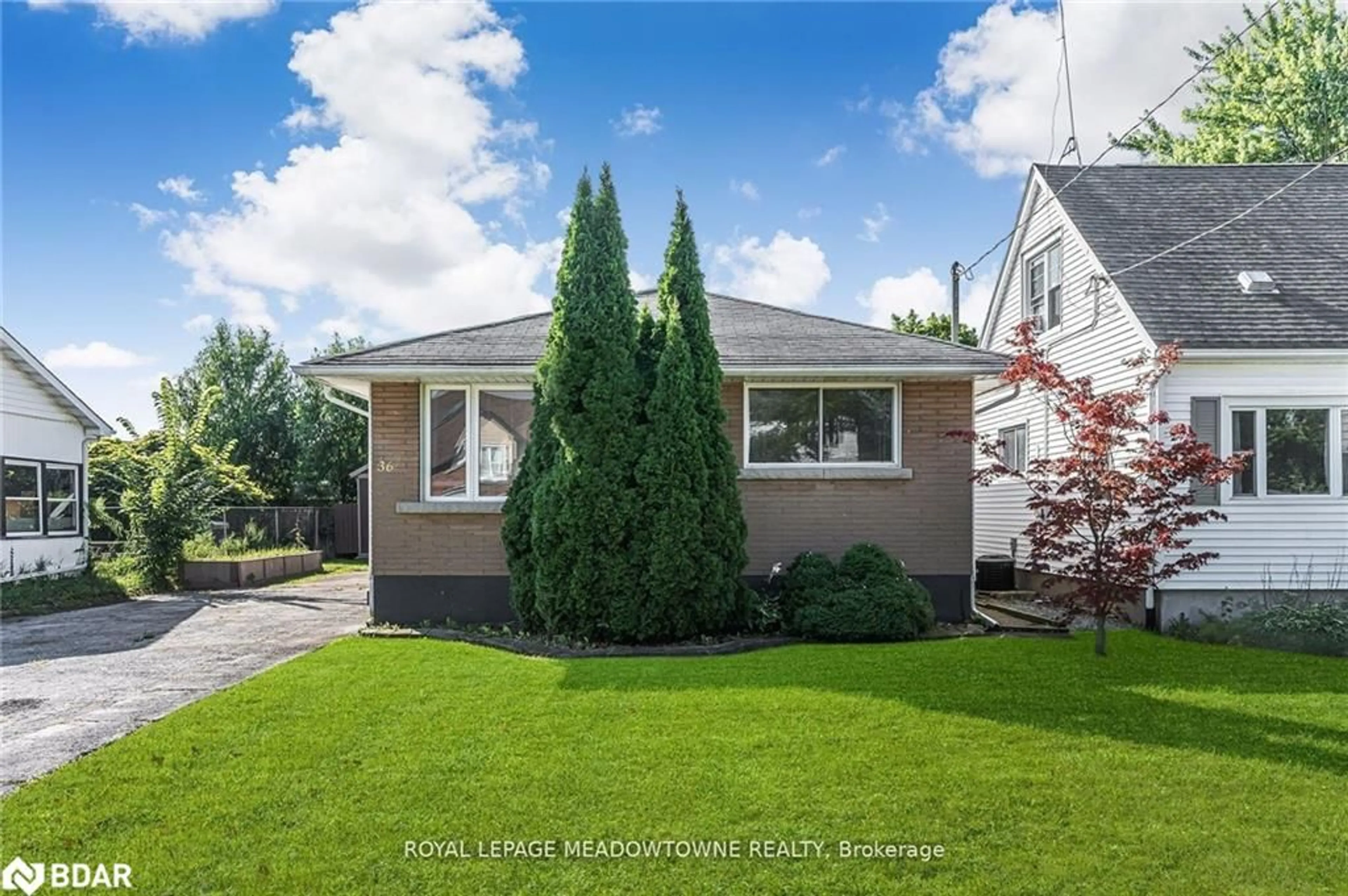 Frontside or backside of a home, the fenced backyard for 36 Fawell Ave, St. Catharines Ontario L2S 2V6