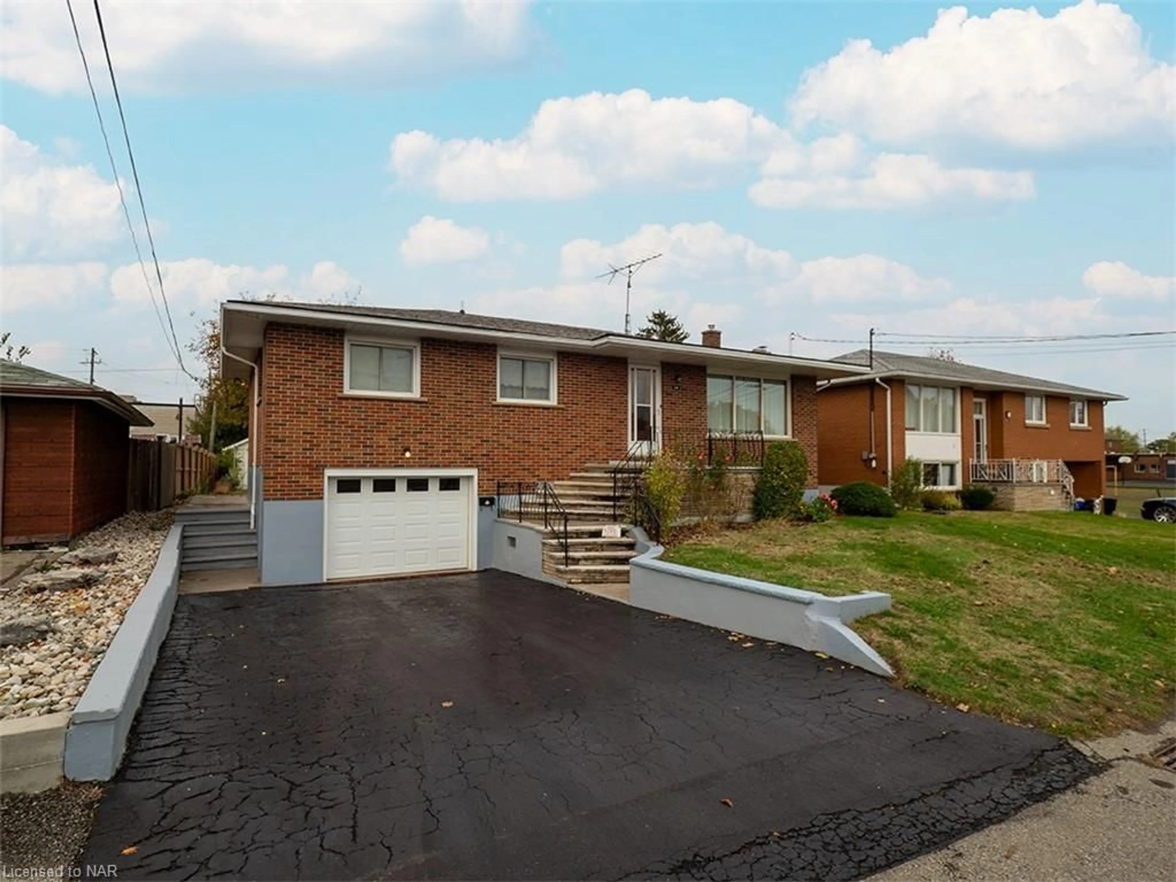 Frontside or backside of a home, the street view for 14 Brock Street, Port Colborne Ontario L3K 3L3