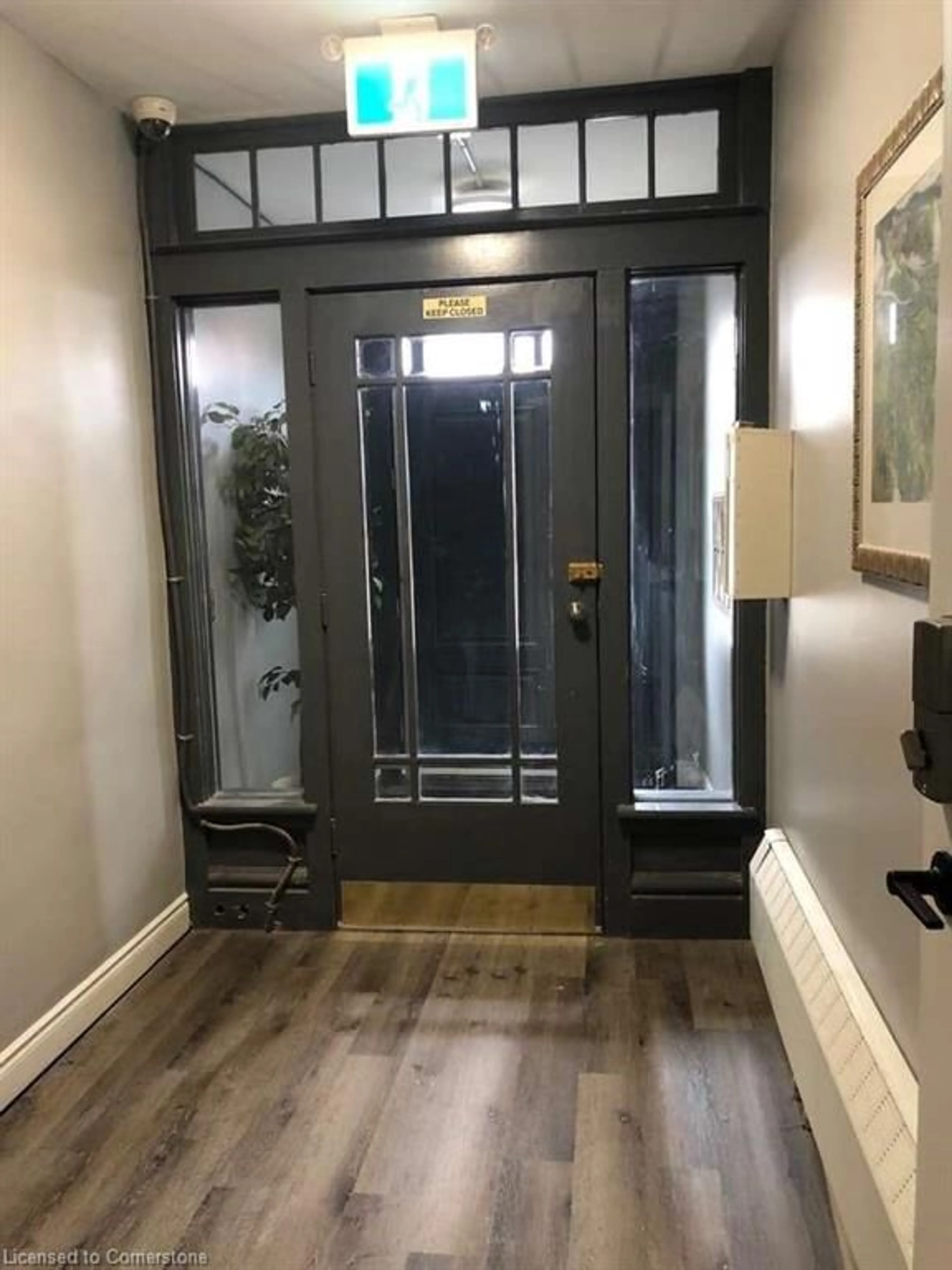 Indoor entryway, wood floors for 590 Main St, Hamilton Ontario L8M 1J6