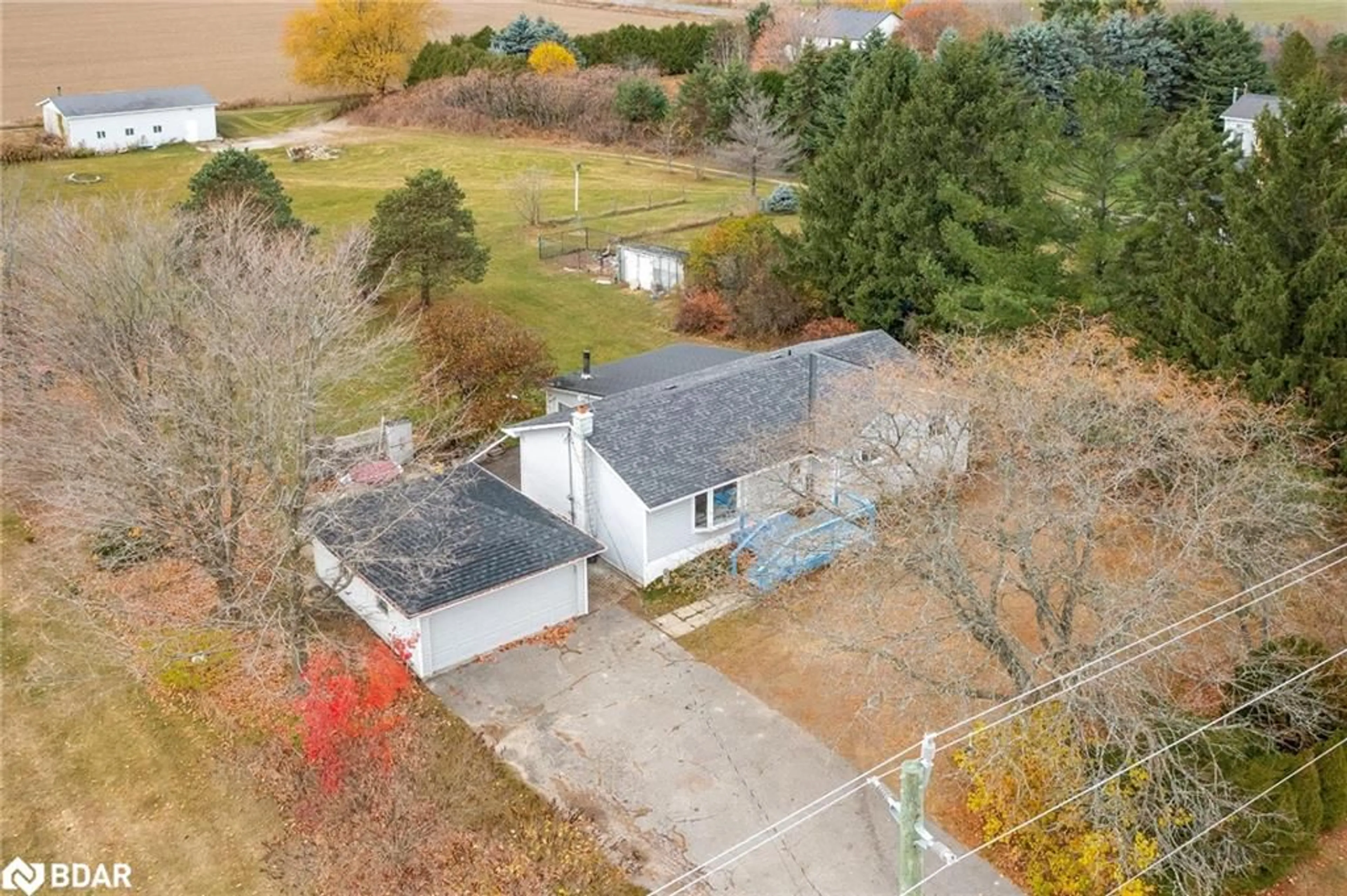 Frontside or backside of a home, the fenced backyard for 3810 10 Sideroad, Bradford West Gwillimbury Ontario L3Z 2A5