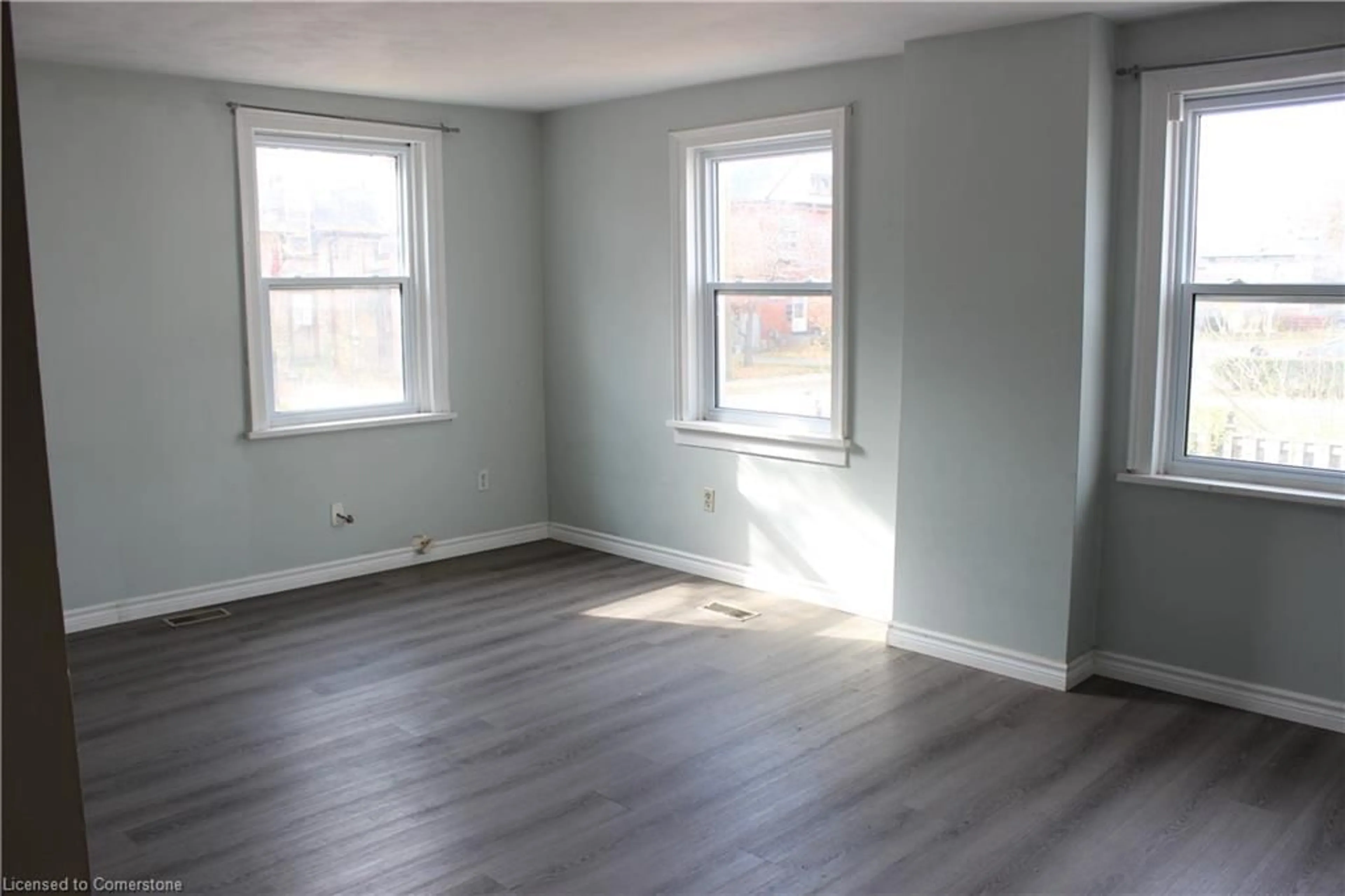 A pic of a room, wood floors for 1125-1127 Duke St, Cambridge Ontario N3H 3V5