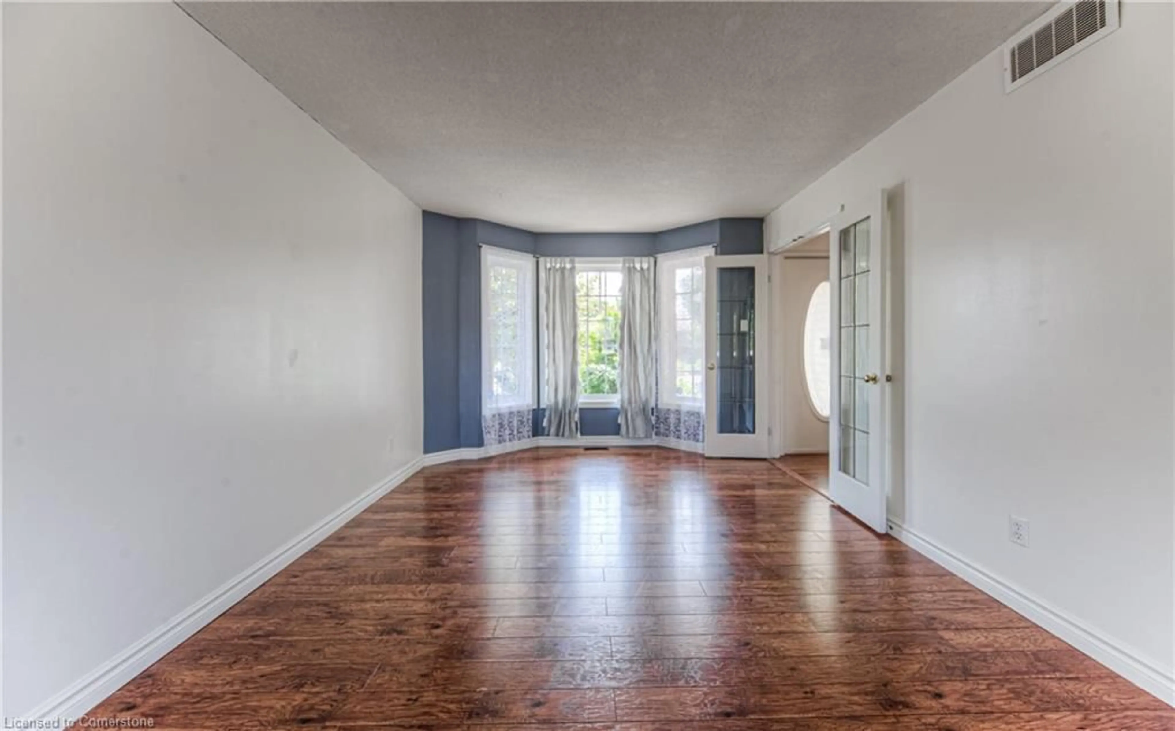 A pic of a room, wood floors for 526 Westfield Dr, Waterloo Ontario N2T 2E1