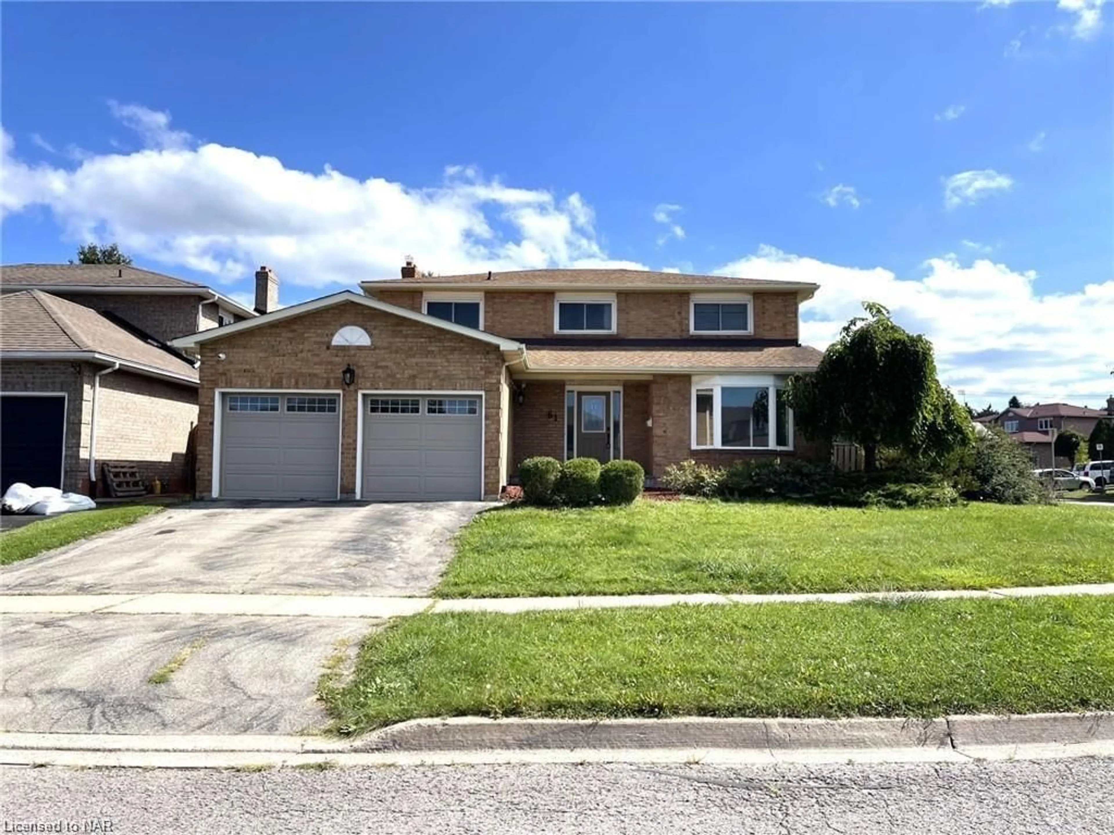 Frontside or backside of a home, the street view for 61 Barbican Trail, St. Catharines Ontario L2T 4A7