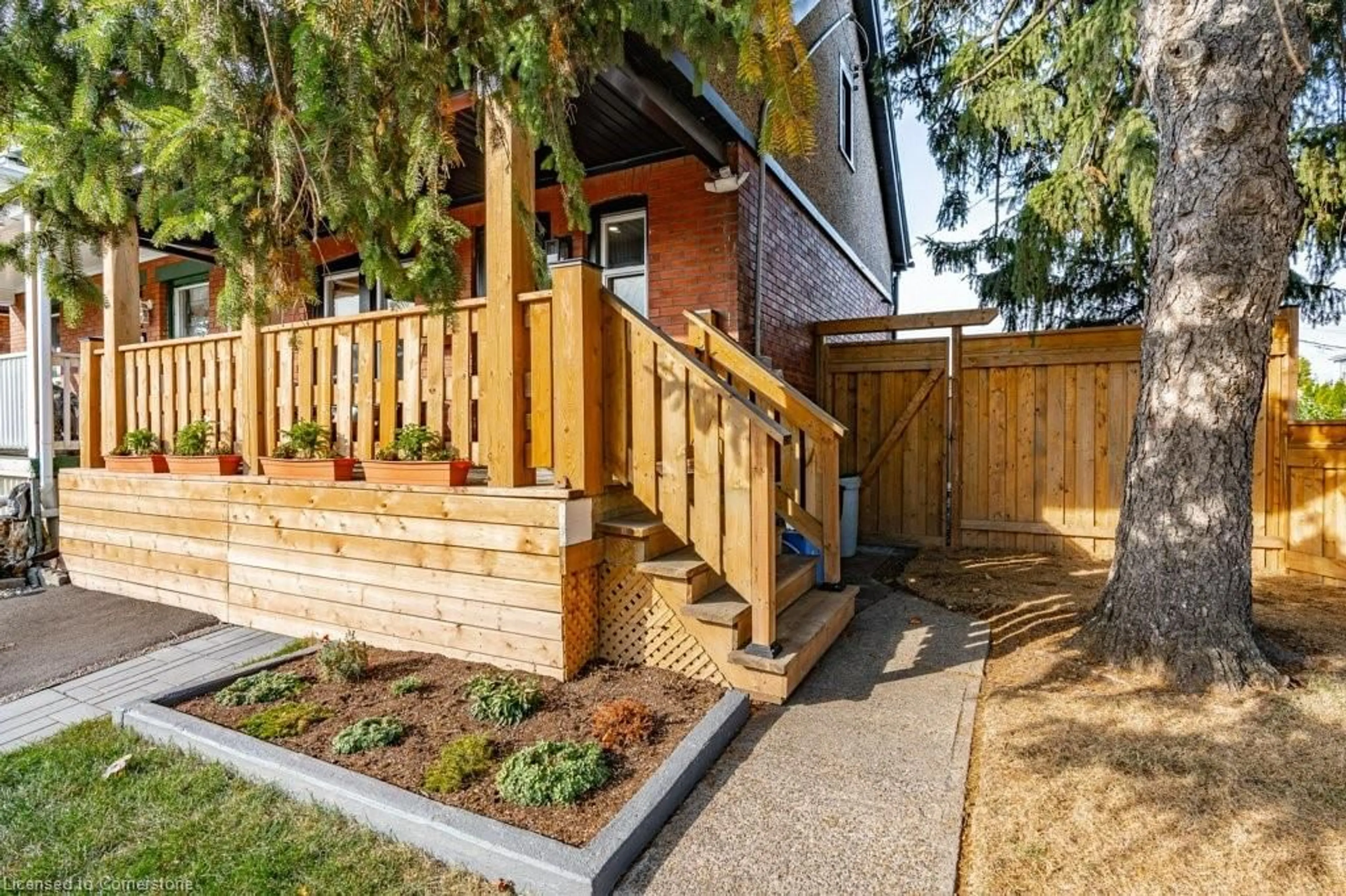 Patio, the fenced backyard for 163 Cameron Ave, Hamilton Ontario L8H 4Z4