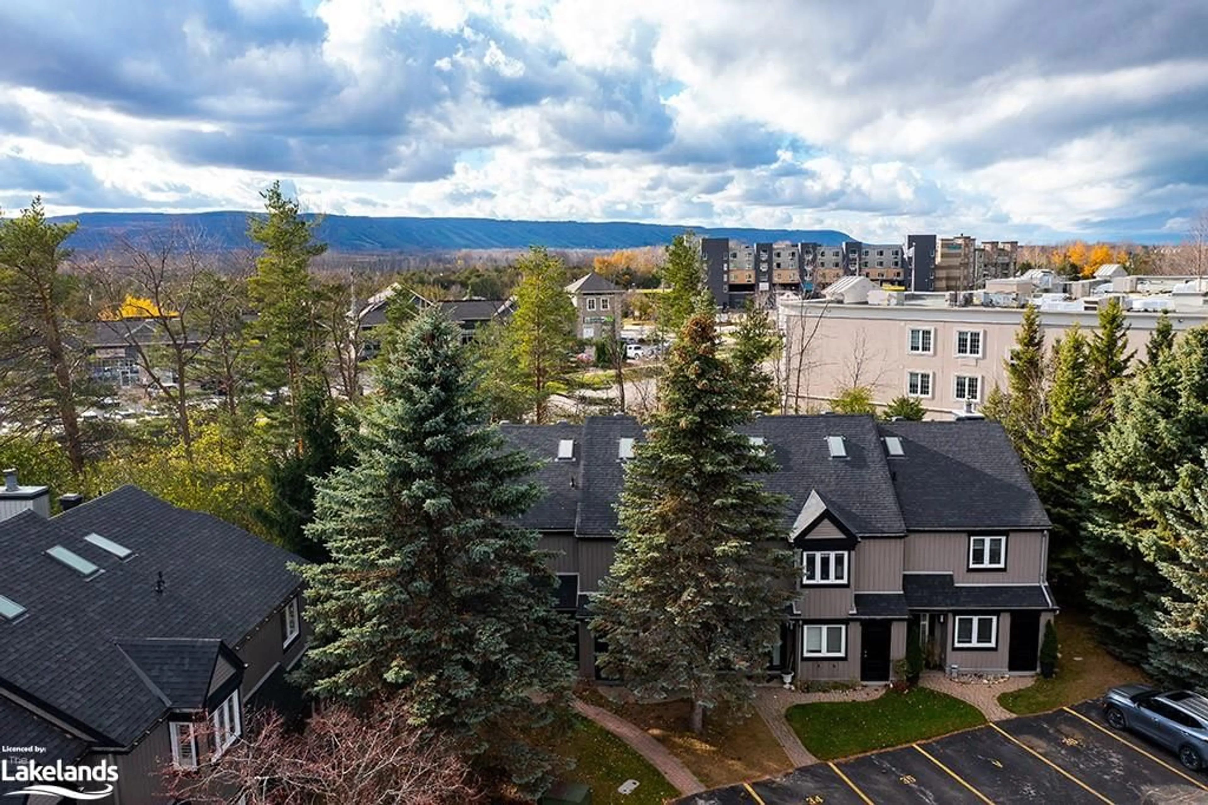 A pic from exterior of the house or condo, the view of city buildings for 5 Harbour Street East #34, Collingwood Ontario L9Y 5C1