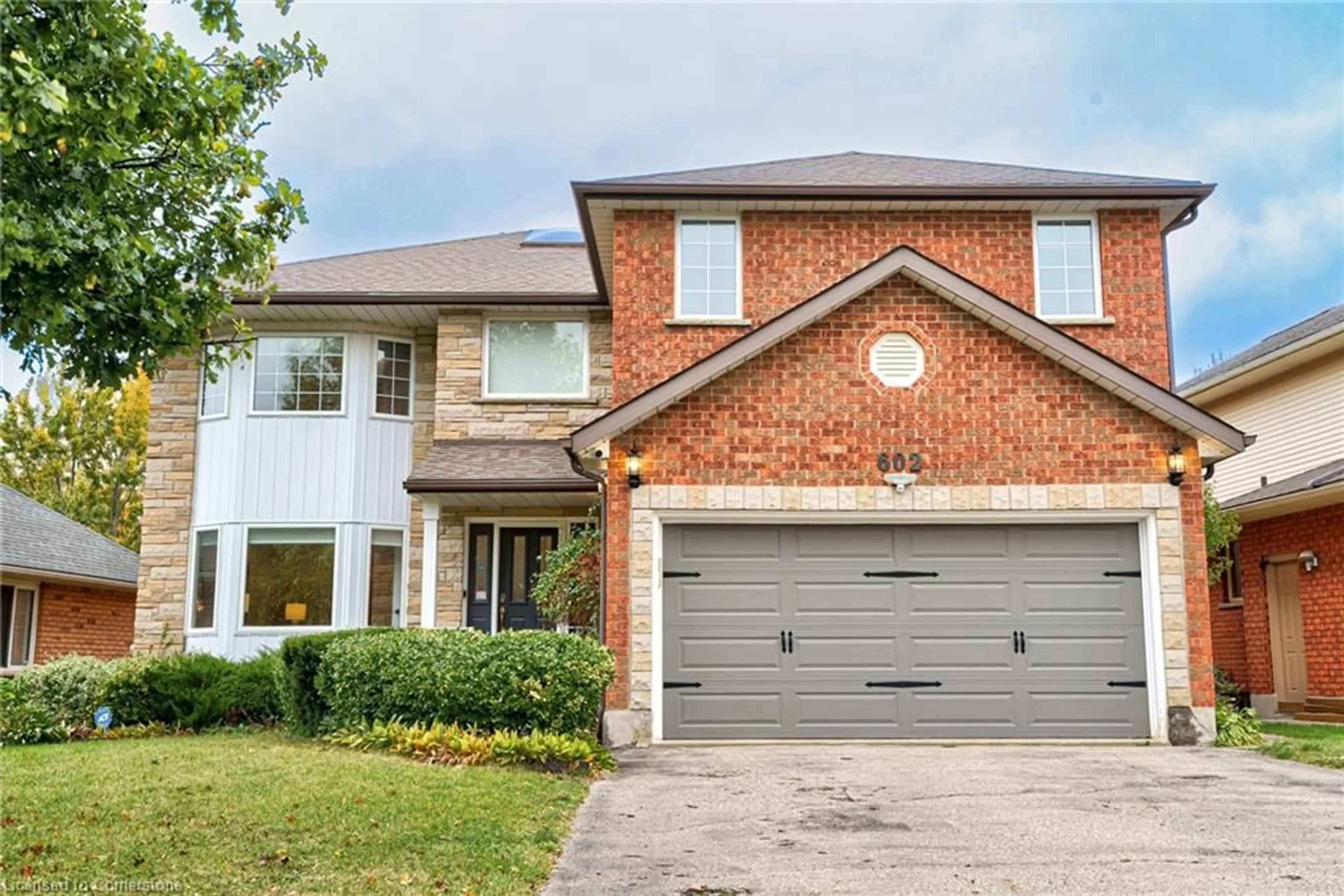 Home with brick exterior material for 602 Beechwood Dr, Waterloo Ontario N2T 1Z4