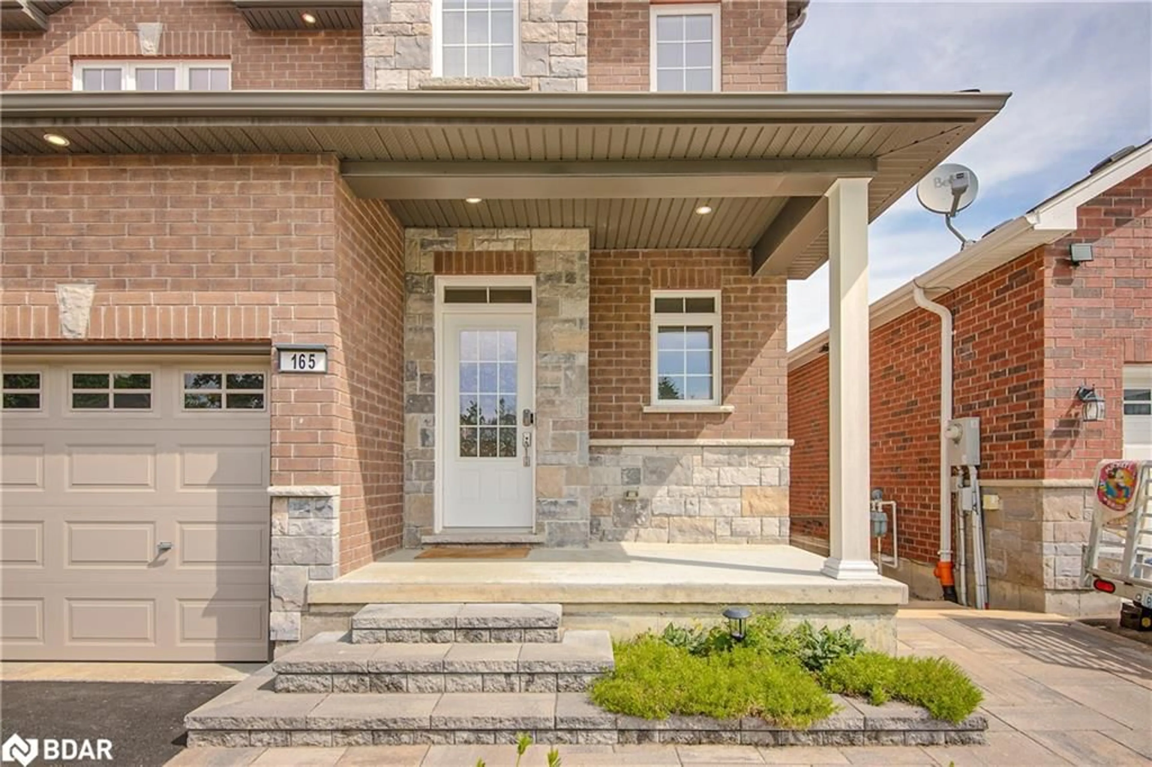 Home with brick exterior material for 165 Bishop Drive, Barrie Ontario L4N 6X5