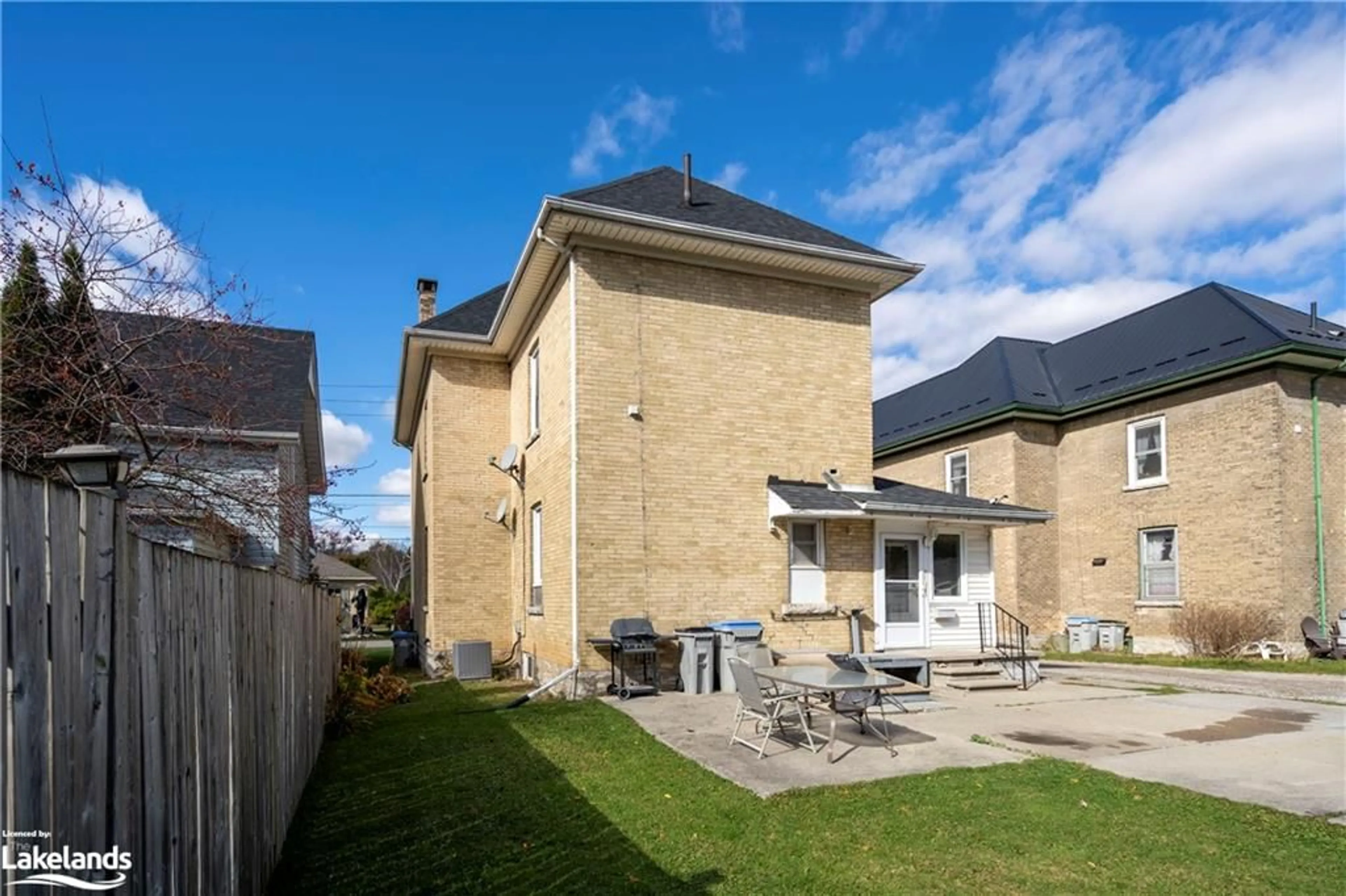 Frontside or backside of a home, the fenced backyard for 187 Water St, St. Marys Ontario N4Z 1A4