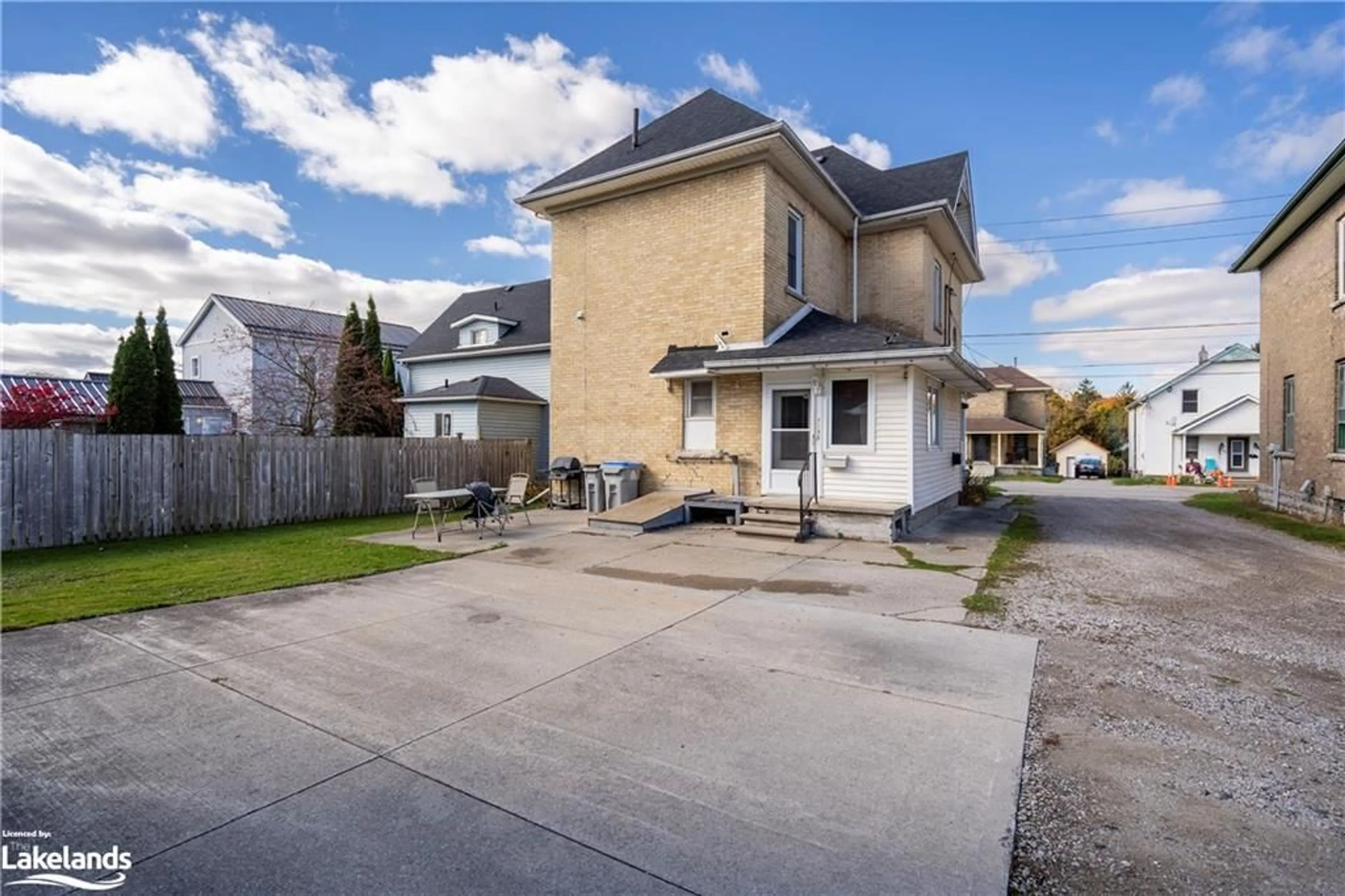 Frontside or backside of a home, the fenced backyard for 187 Water St, St. Marys Ontario N4Z 1A4