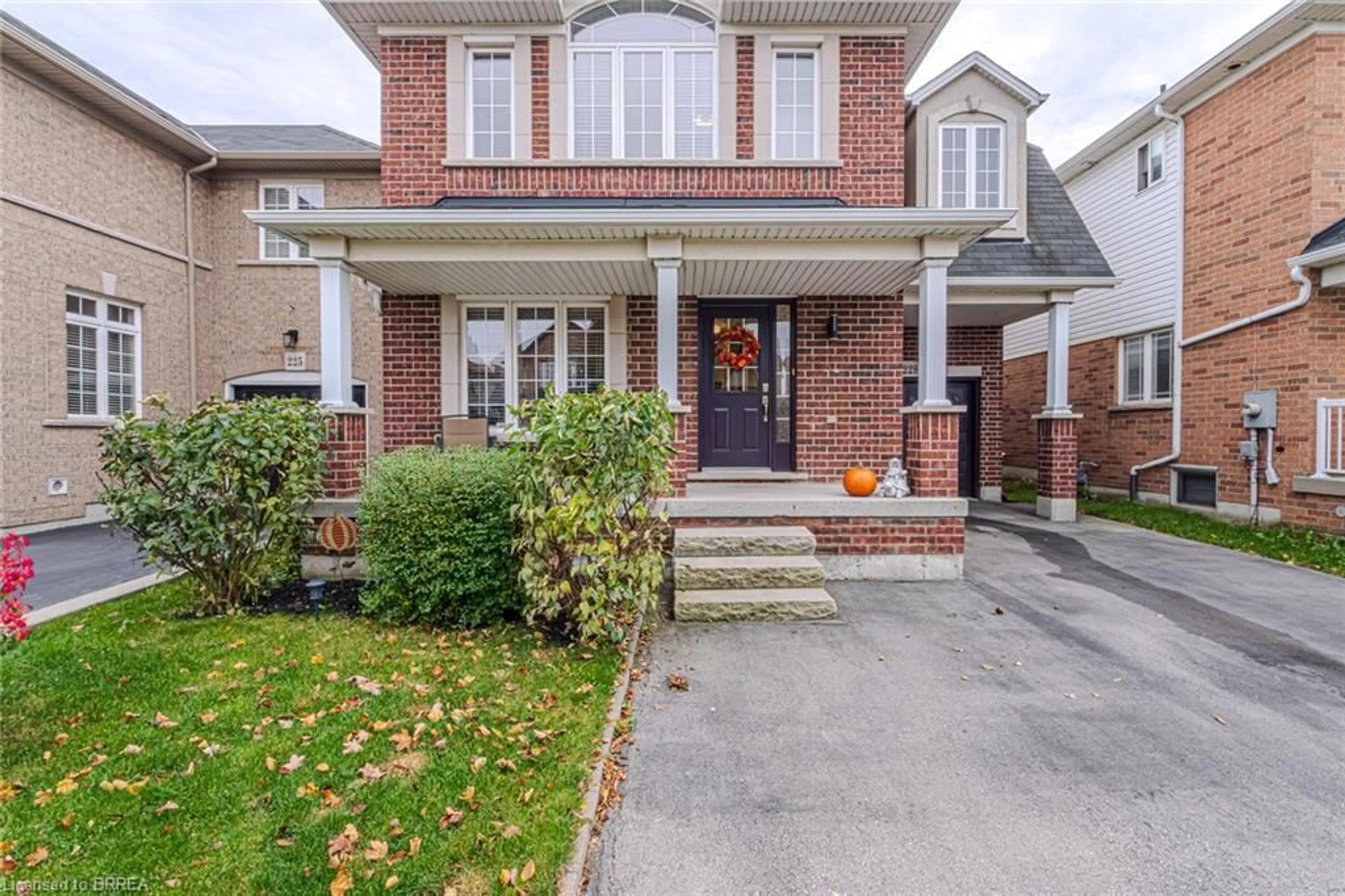 Home with brick exterior material for 229 Springvalley Cres, Hamilton Ontario L9C 0B3