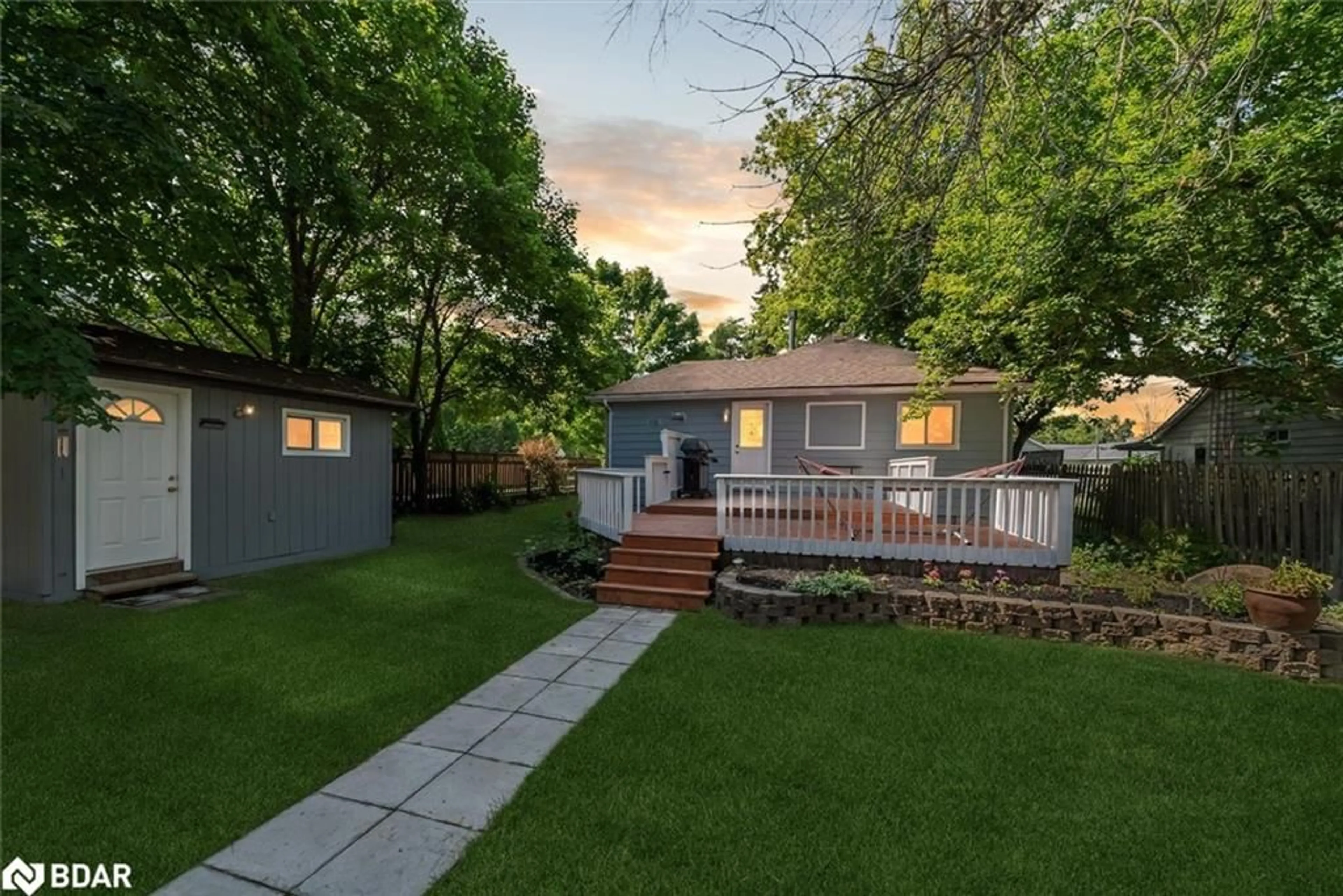 Frontside or backside of a home, the fenced backyard for 787 Churchill Lane, Georgina Ontario L0E 1S0