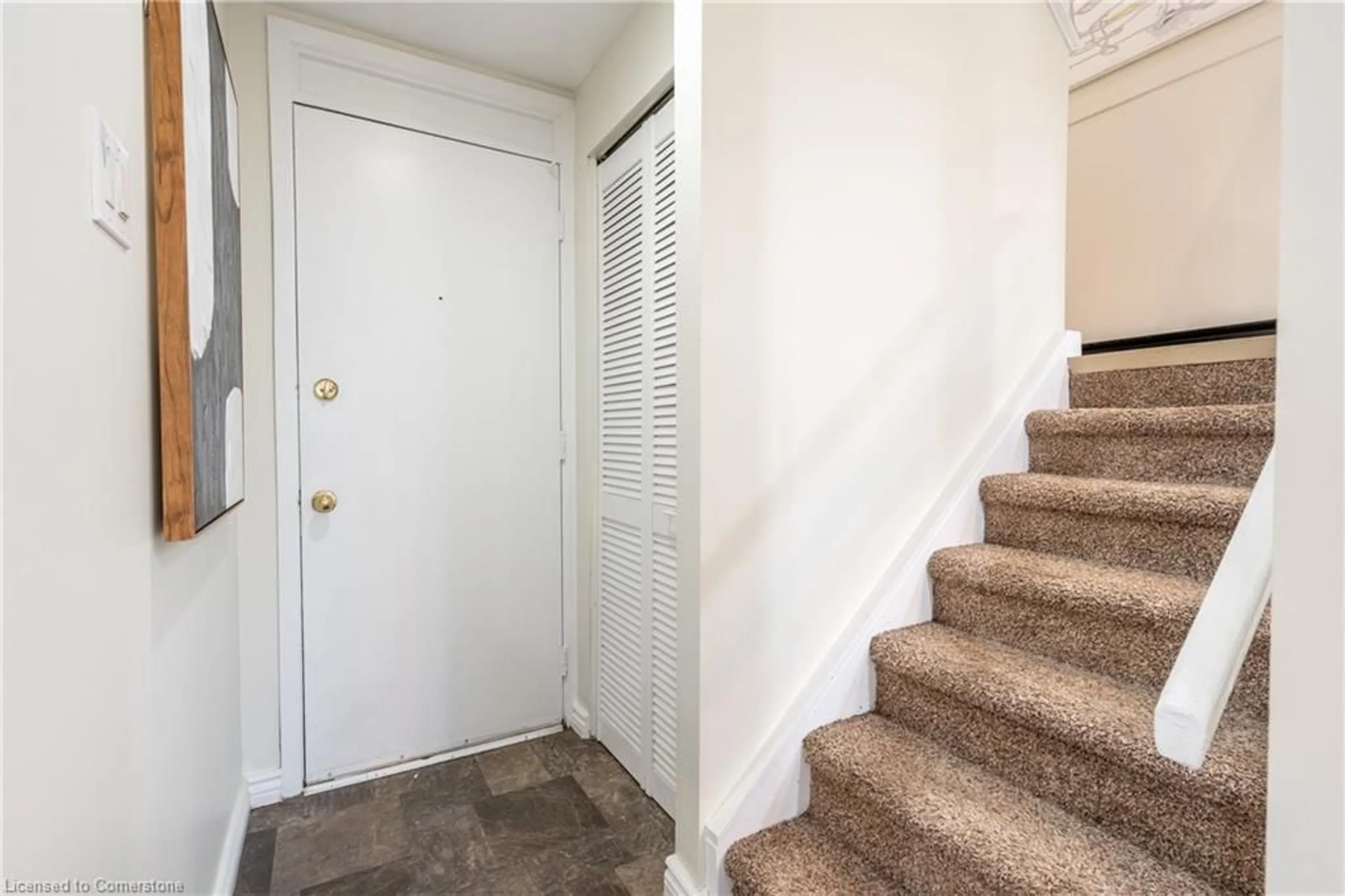 Indoor entryway, carpet floors for 25 Britten Close #B52, Hamilton Ontario L9C 4J8