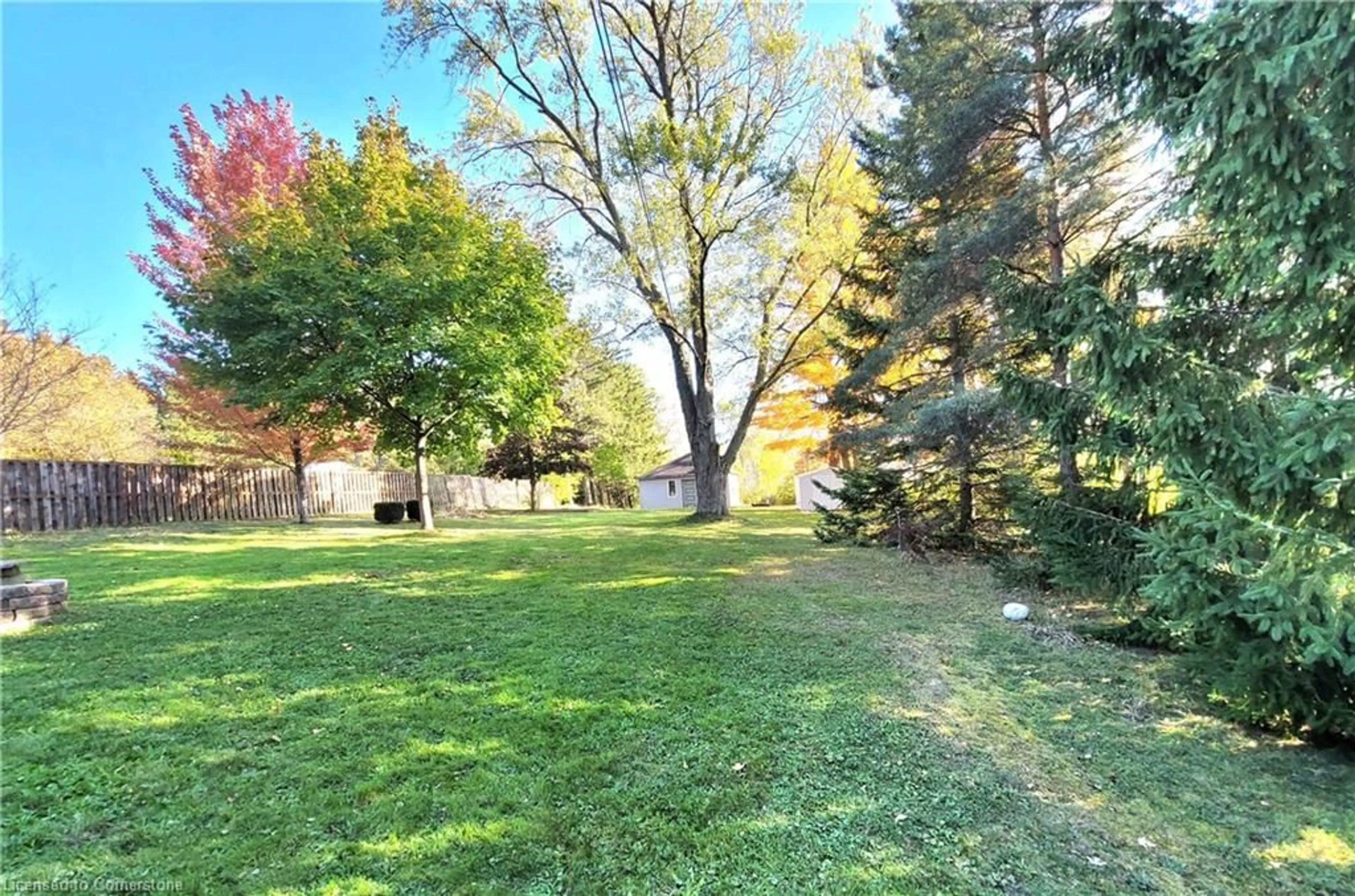 Patio, the fenced backyard for 111 Riverbank Dr, Cambridge Ontario N3H 4R6