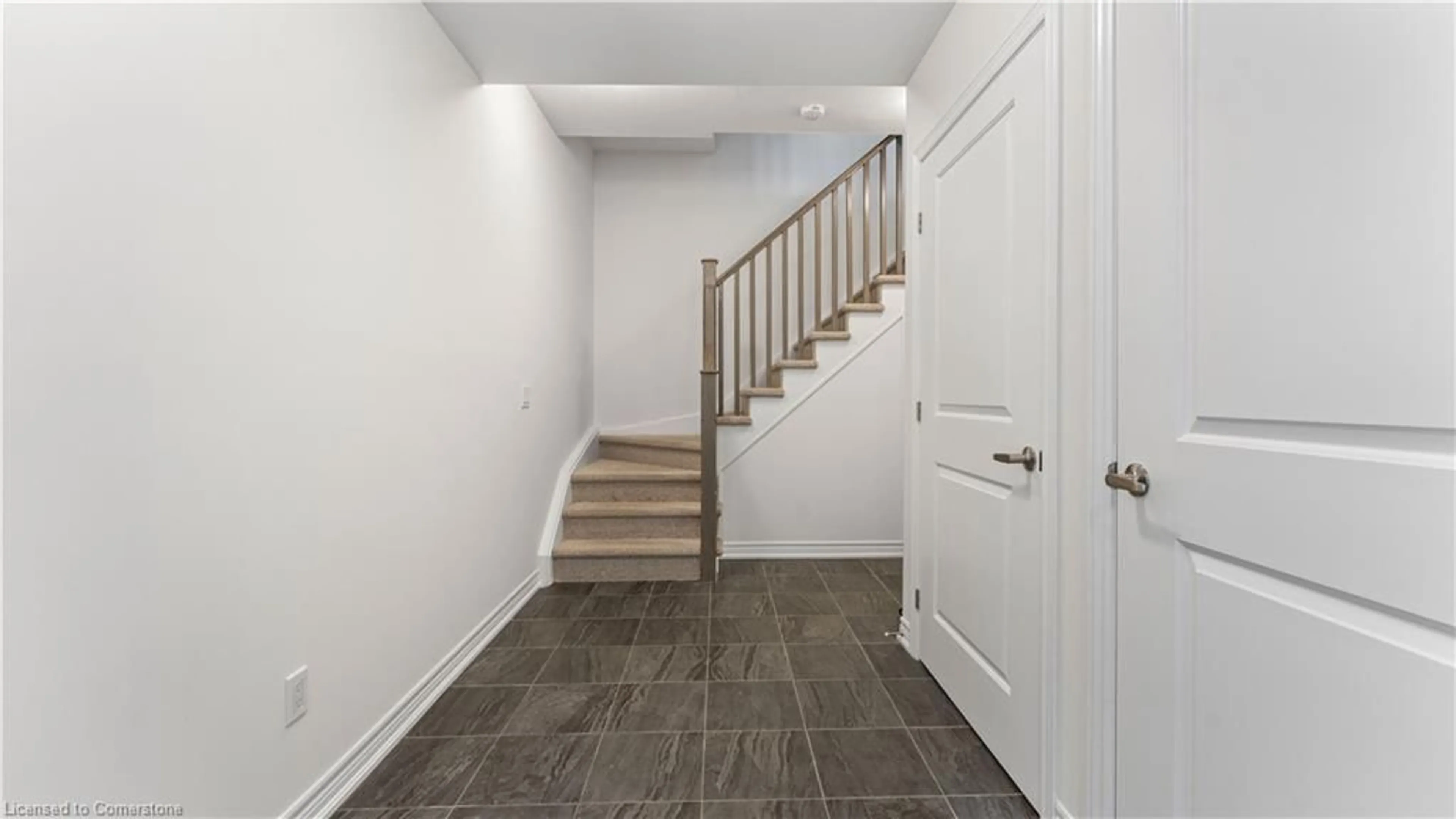 Indoor foyer, wood floors for 77 Diana Ave #113, Brantford Ontario N3T 0R6