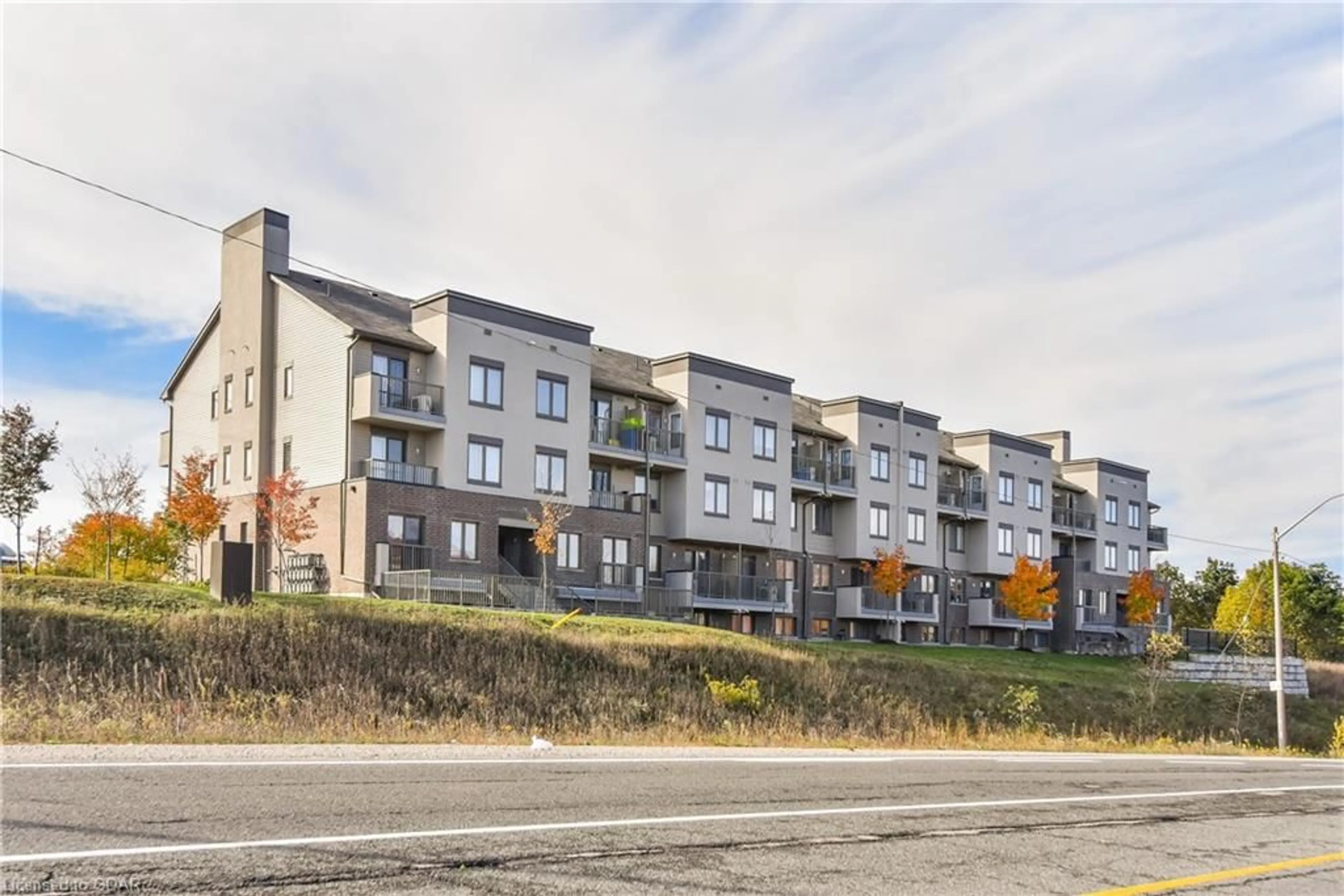 A pic from exterior of the house or condo, the street view for 350 Fisher Mills Rd #A25, Cambridge Ontario N3C 2Z2