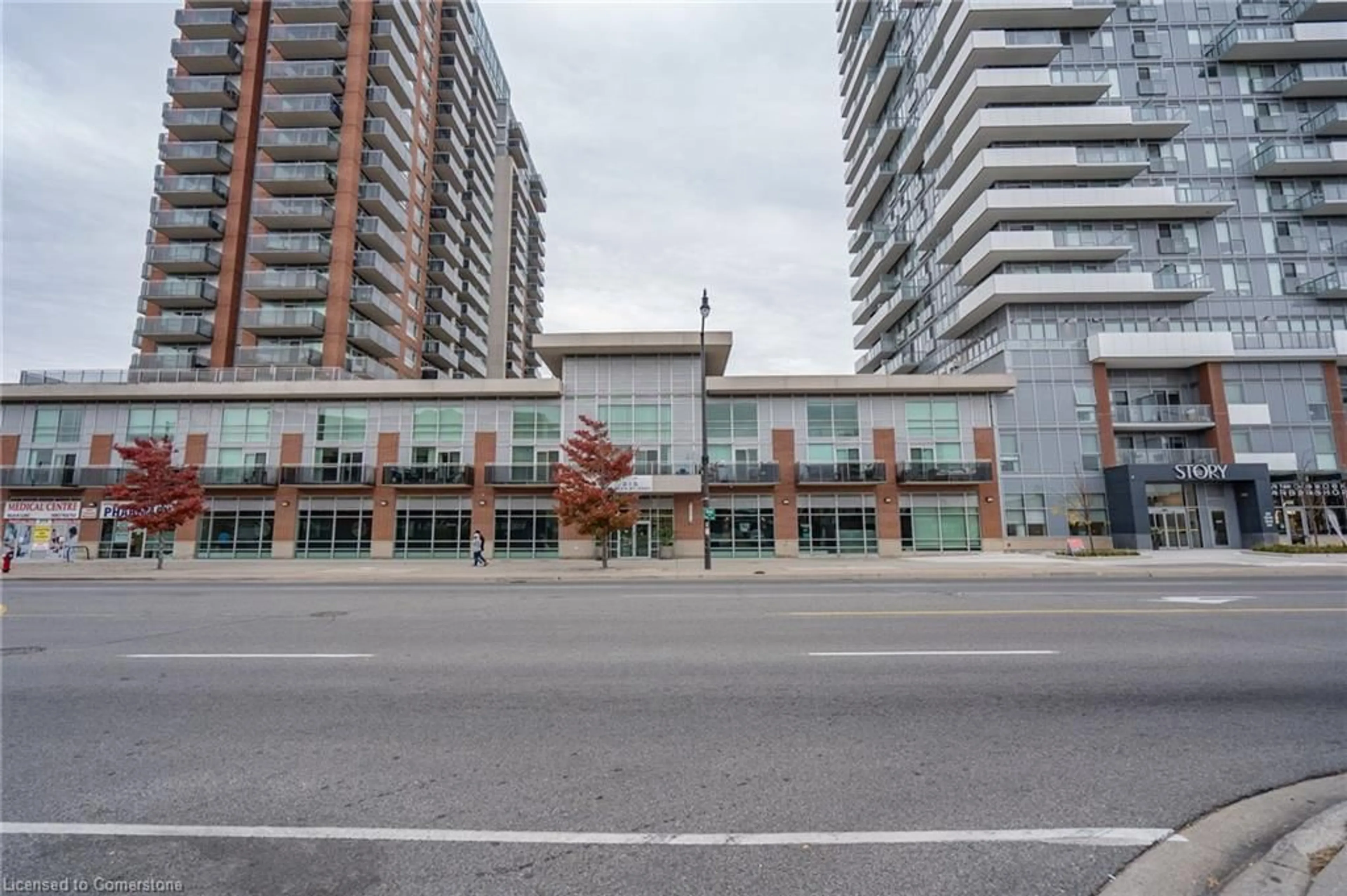 A pic from exterior of the house or condo, the street view for 215 Queen St #102, Brampton Ontario L6W 0A9