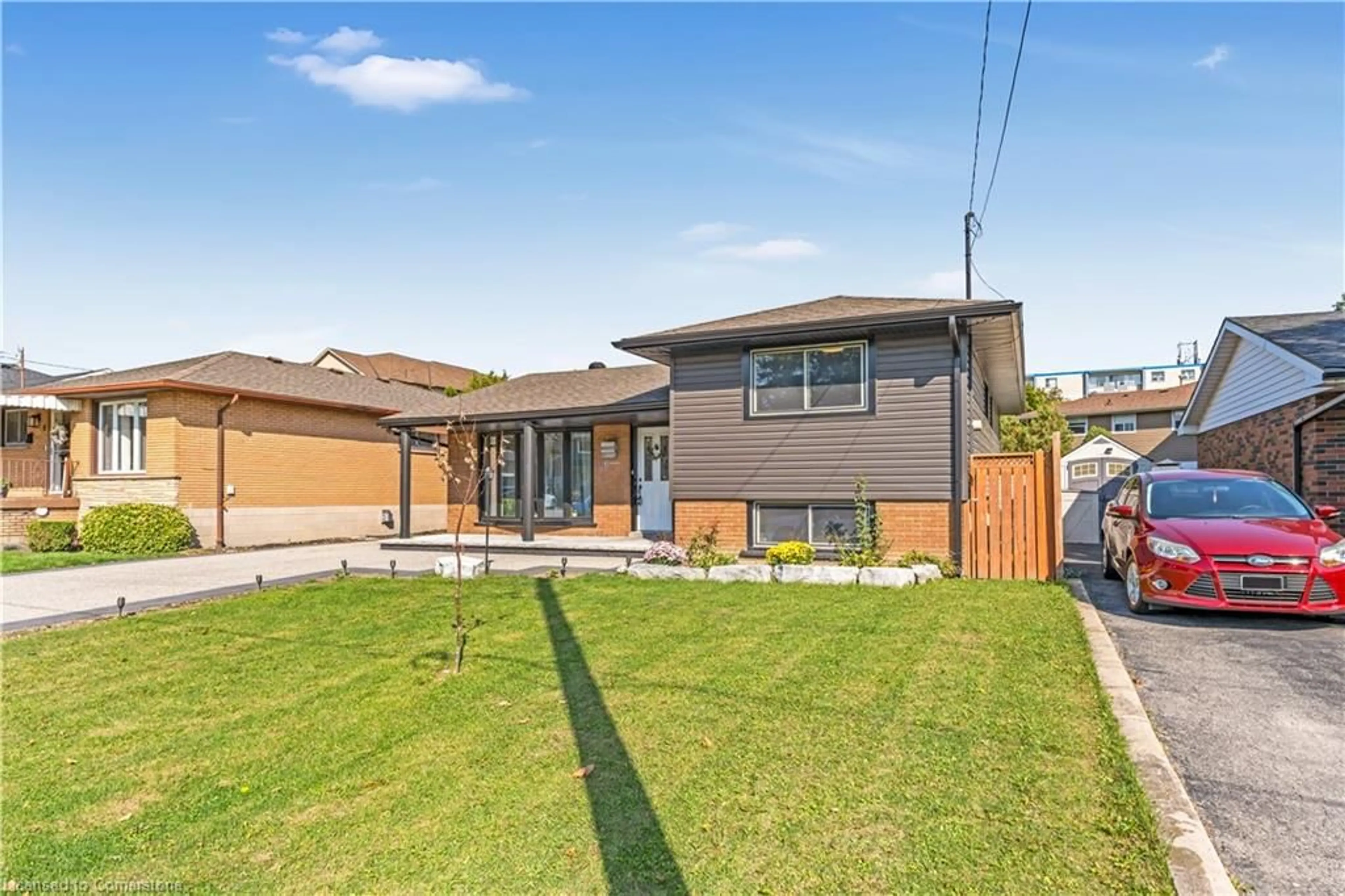 Frontside or backside of a home, the fenced backyard for 6 Rideau Cres, Hamilton Ontario L8T 2S9